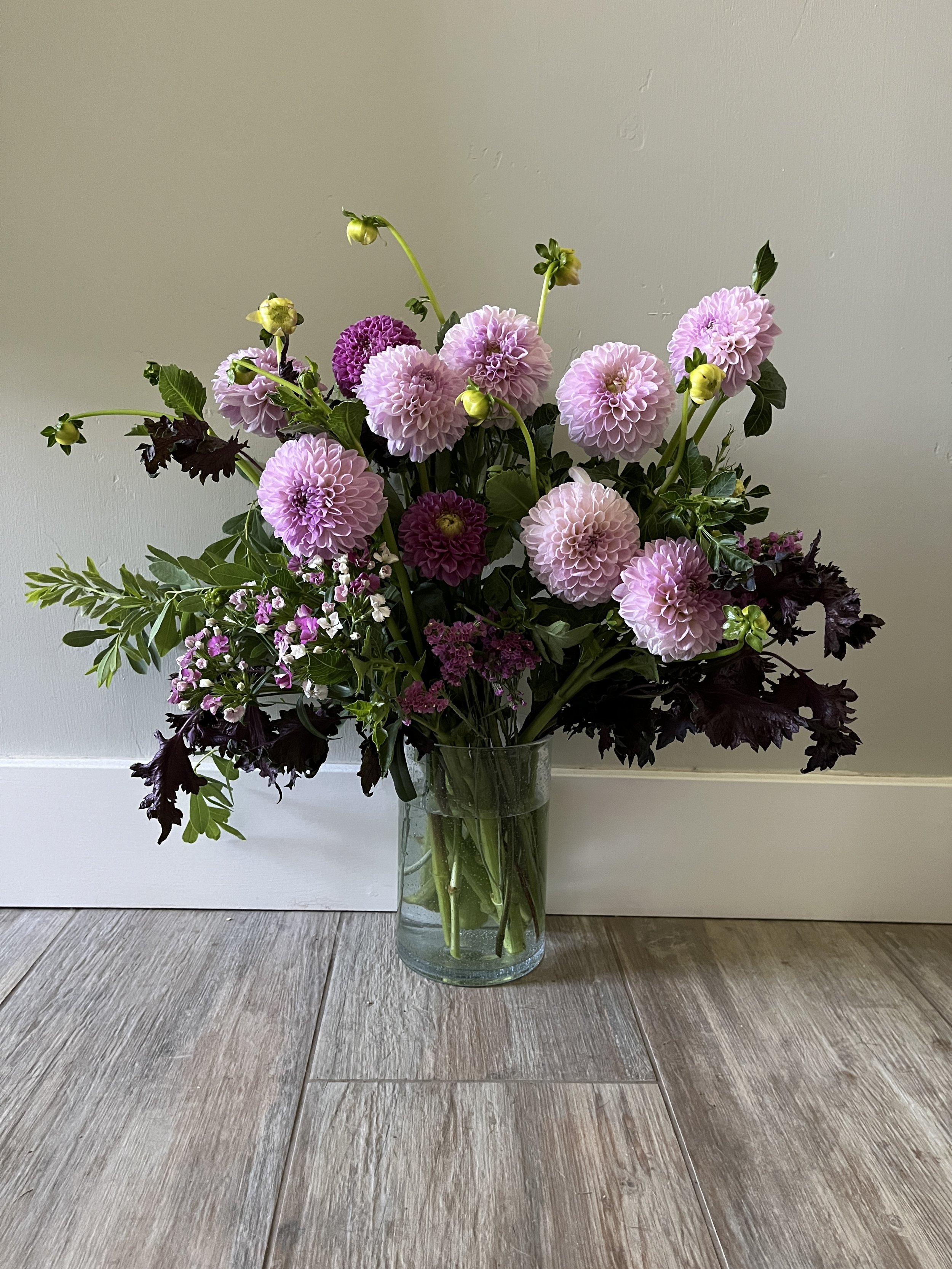 a bouquet of purple dahlias