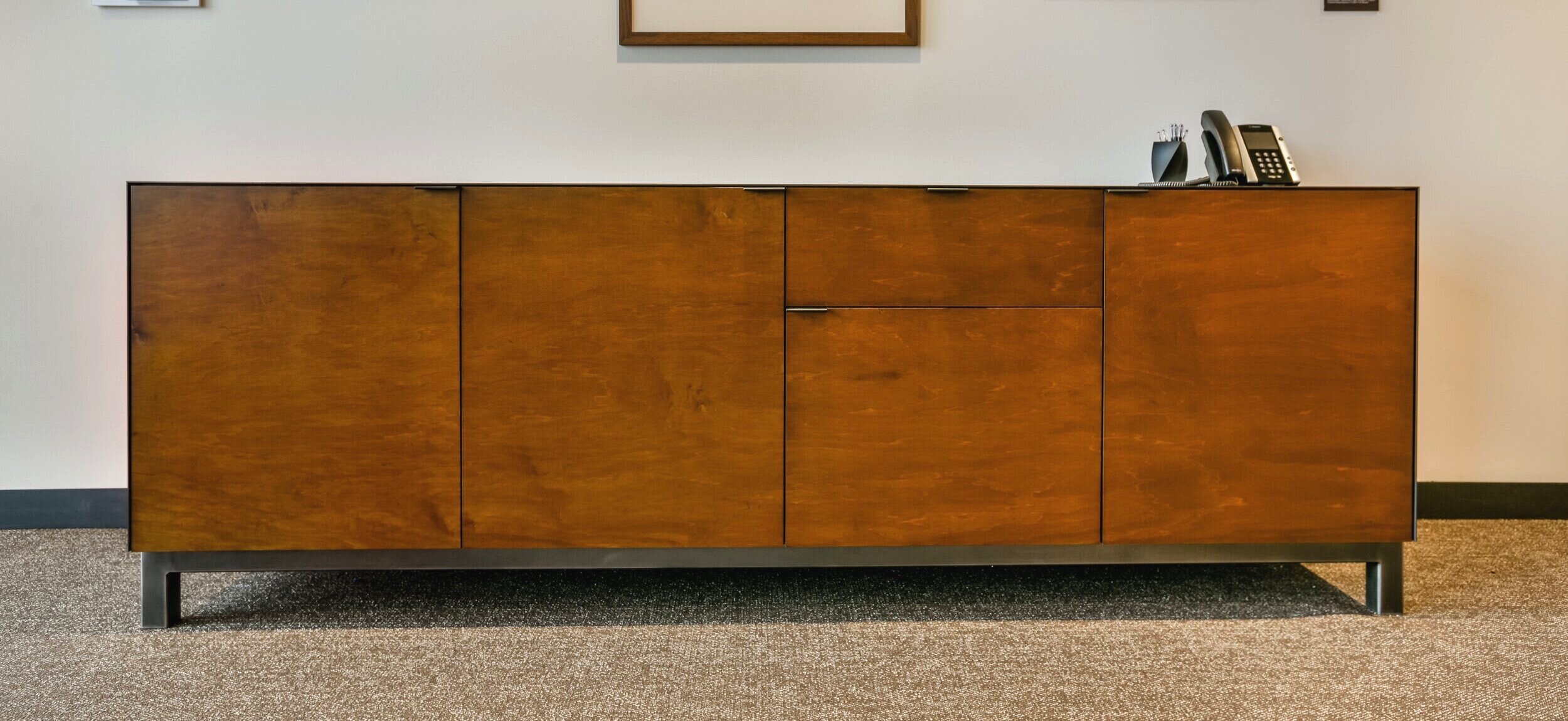 Maple premium ply credenza in gingersnap finish  