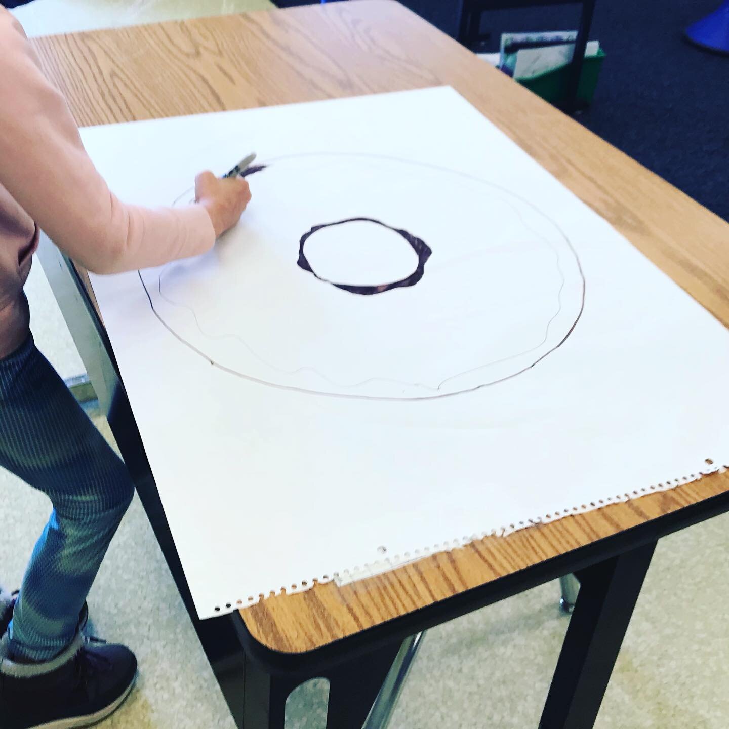 Getting a student to engage is just a matter of connecting with their interests. This student sits at her desk every morning during the arrival window and does not engage in any activity. That is until I asked her to color in my donut craft for me. S