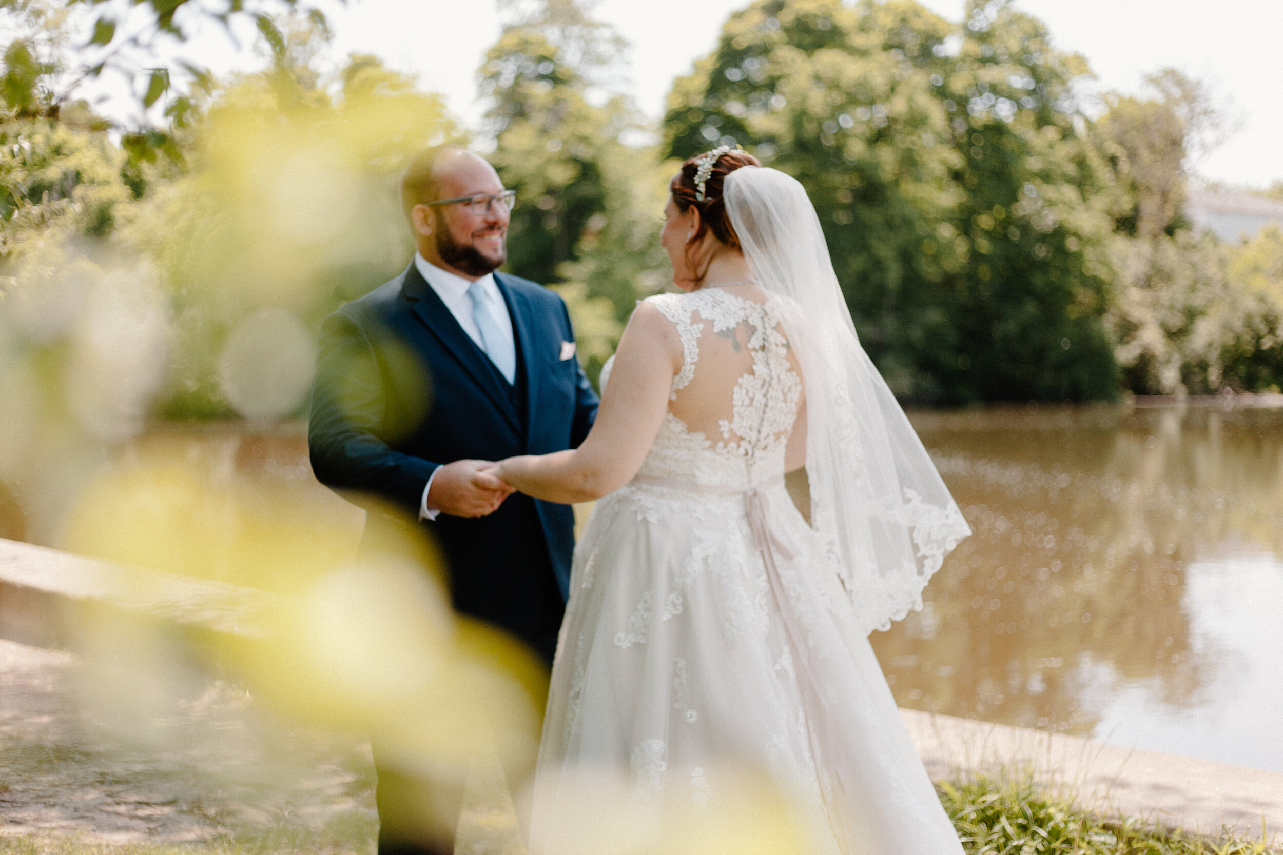 Midwest Wedding and Elopement Photographer. Bride and groom see each other for the first time during their first-look in Plymouth, Michigan.