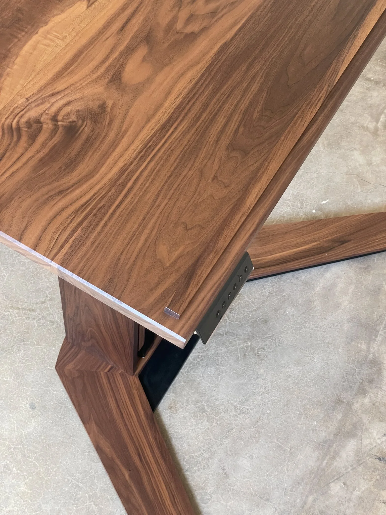 top view of wooden lectern with electronic height adjustability