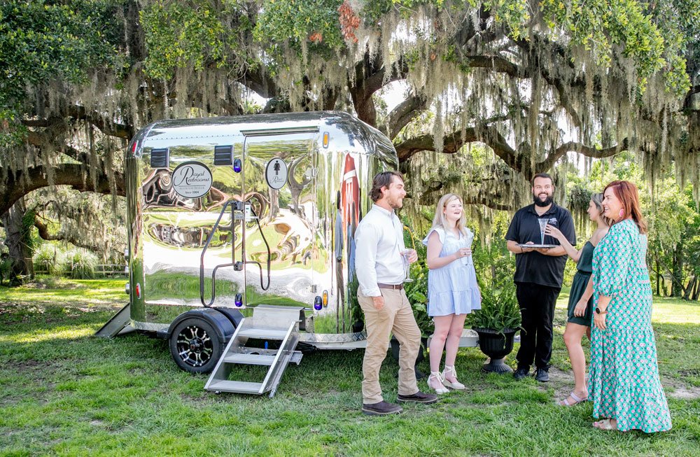 Shiny-Portable-Restroom-is-a-Gathering-Place-at-Events.jpg