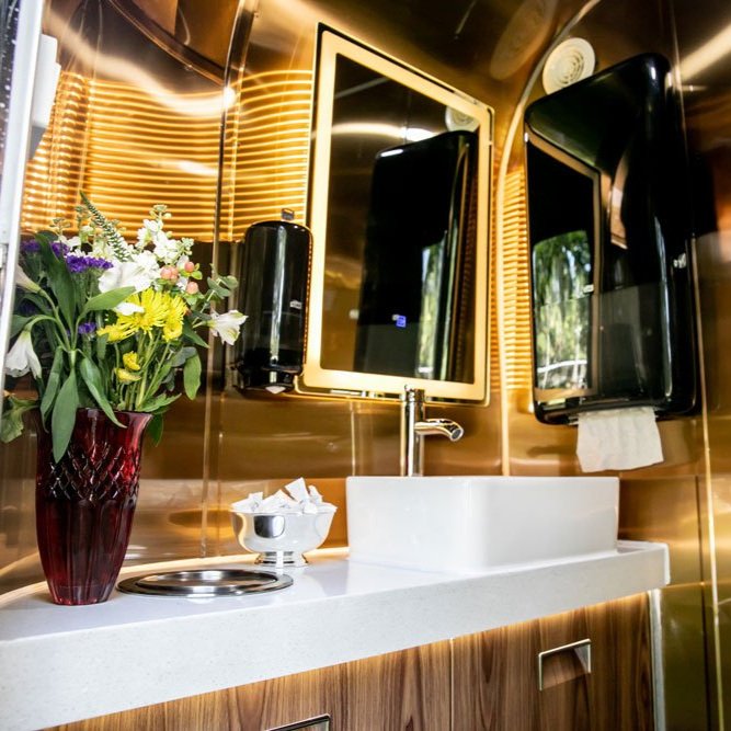 Gorgeous-Gold-Interior-on-Restrooms-for-Events.jpg