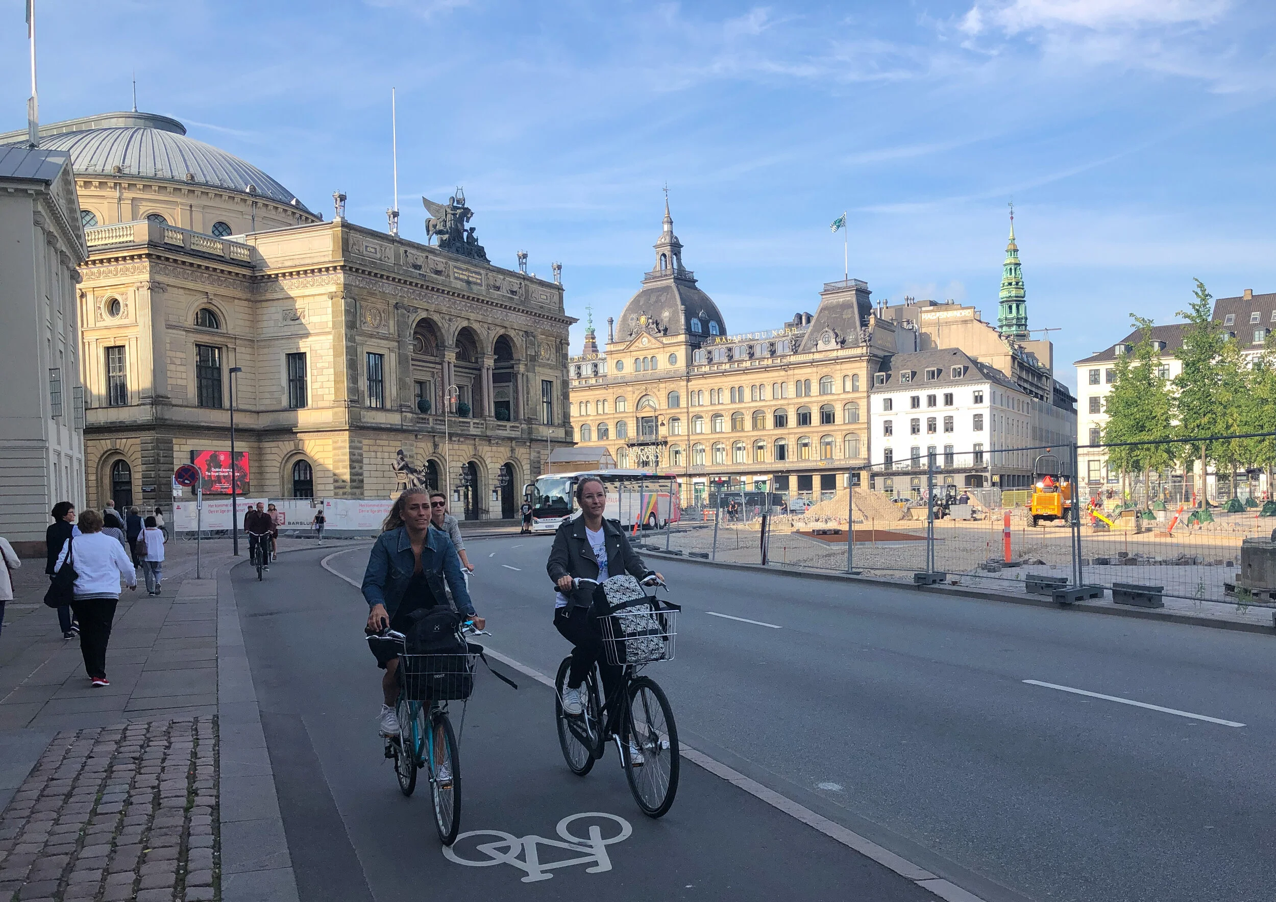 Commuters ride bikes in Copenhagen. This is a common way to get around, and a popular alternative to cars among people of all ages and fitness. The reasonable Danes don’t wear helmets because they don’t crash.