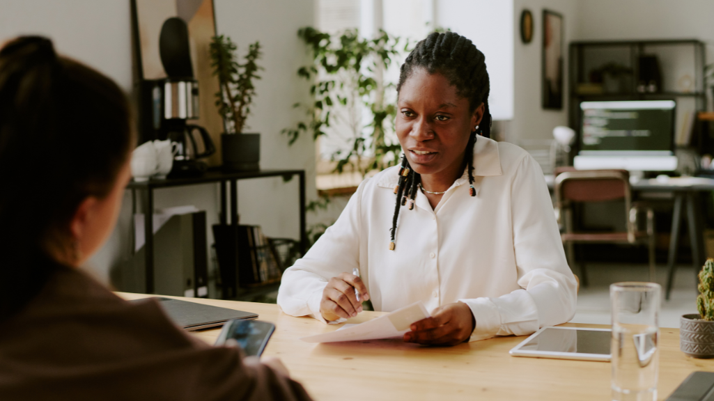 Healing centered life coach supporting a changemaker through a one on one coaching session
