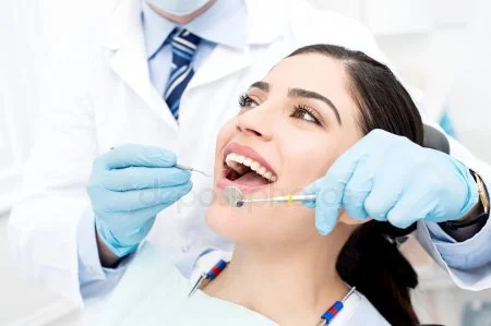 depositphotos_67866333-stock-photo-female-patient-receiving-dental-care.jpg