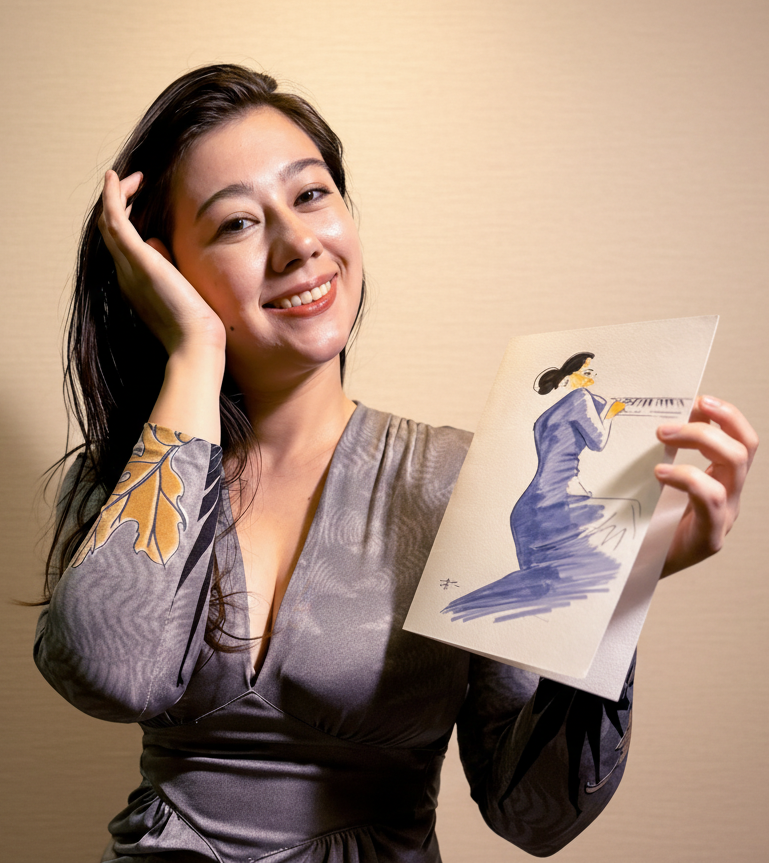 A musician holding a painting of a woman playing the piano, smiling and posing indoors.