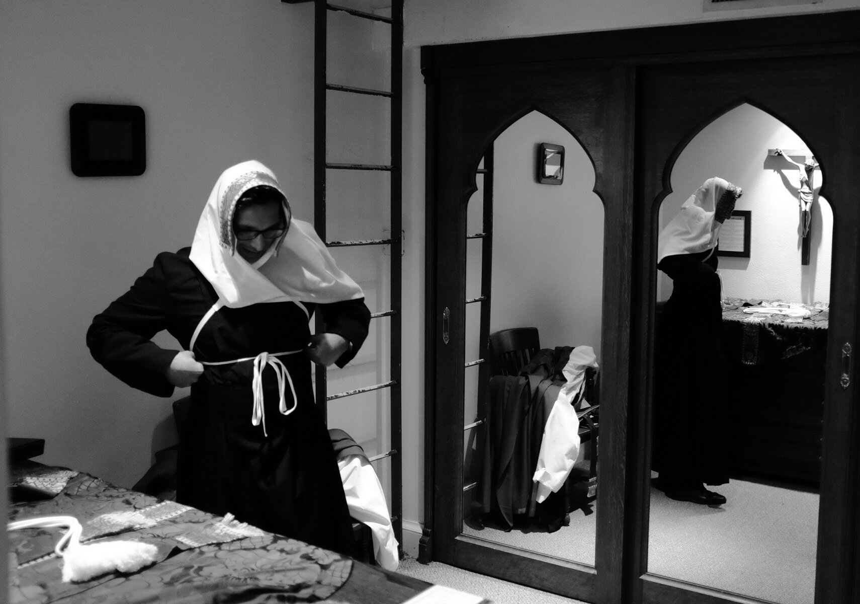 Newly ordained priest, Fr. John Sundara, prepares to celebrate mass for the first time.  Church of the Incarnation, Dallas, TX.