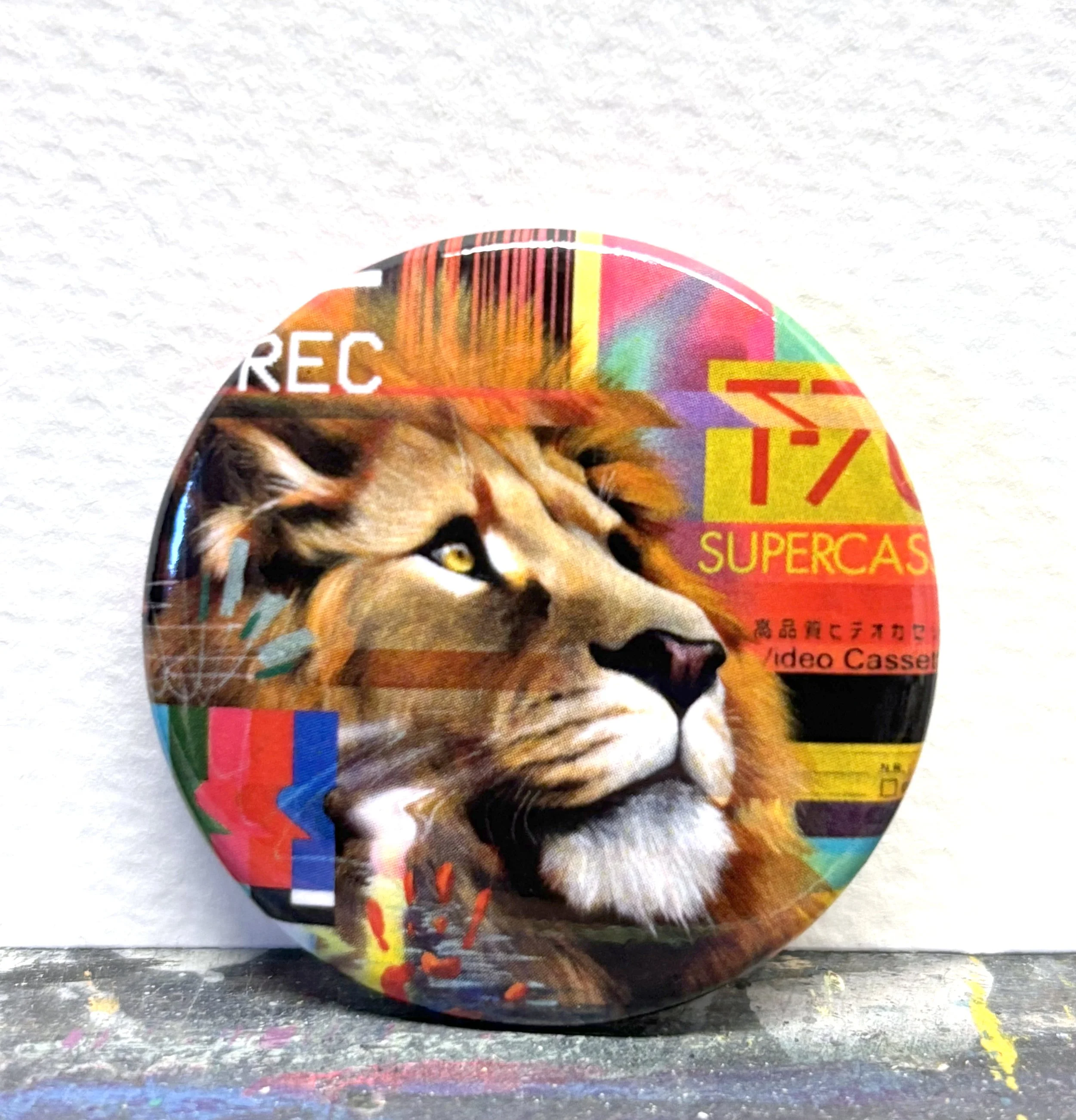 "Supercassette" button pin