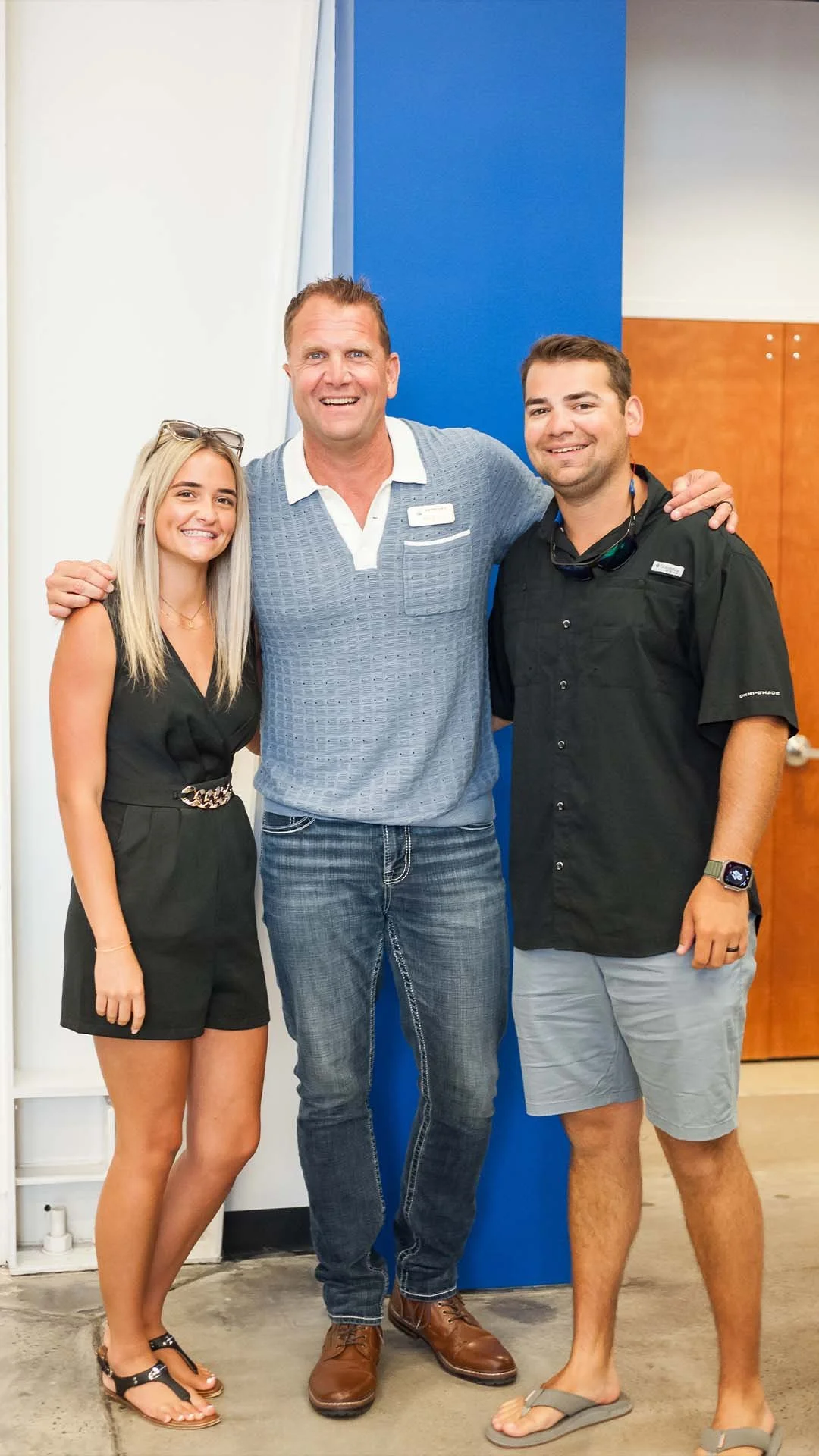 image of dad and two young adult children