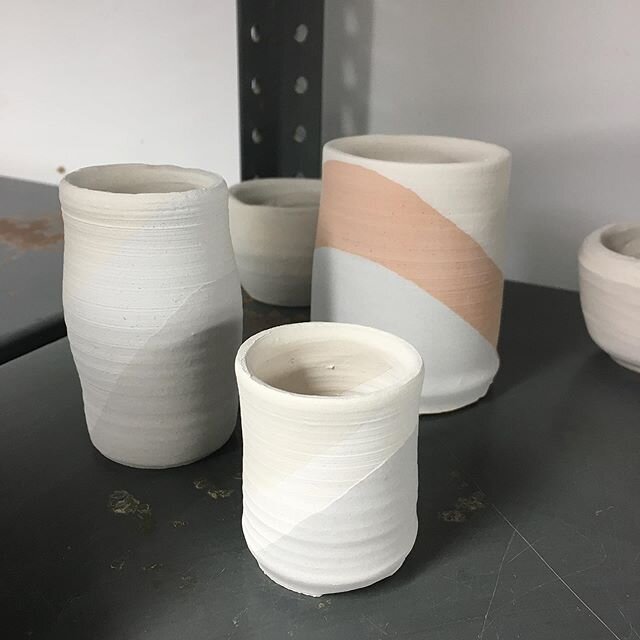 The trio waiting for the  glaze.  They are all corner dipped in clear and white with an unglazed band in the middle so we can assess these clay bodies properly.  Oh, I also made a mistake and made the wrong speckled clay, so super speckled must wait 