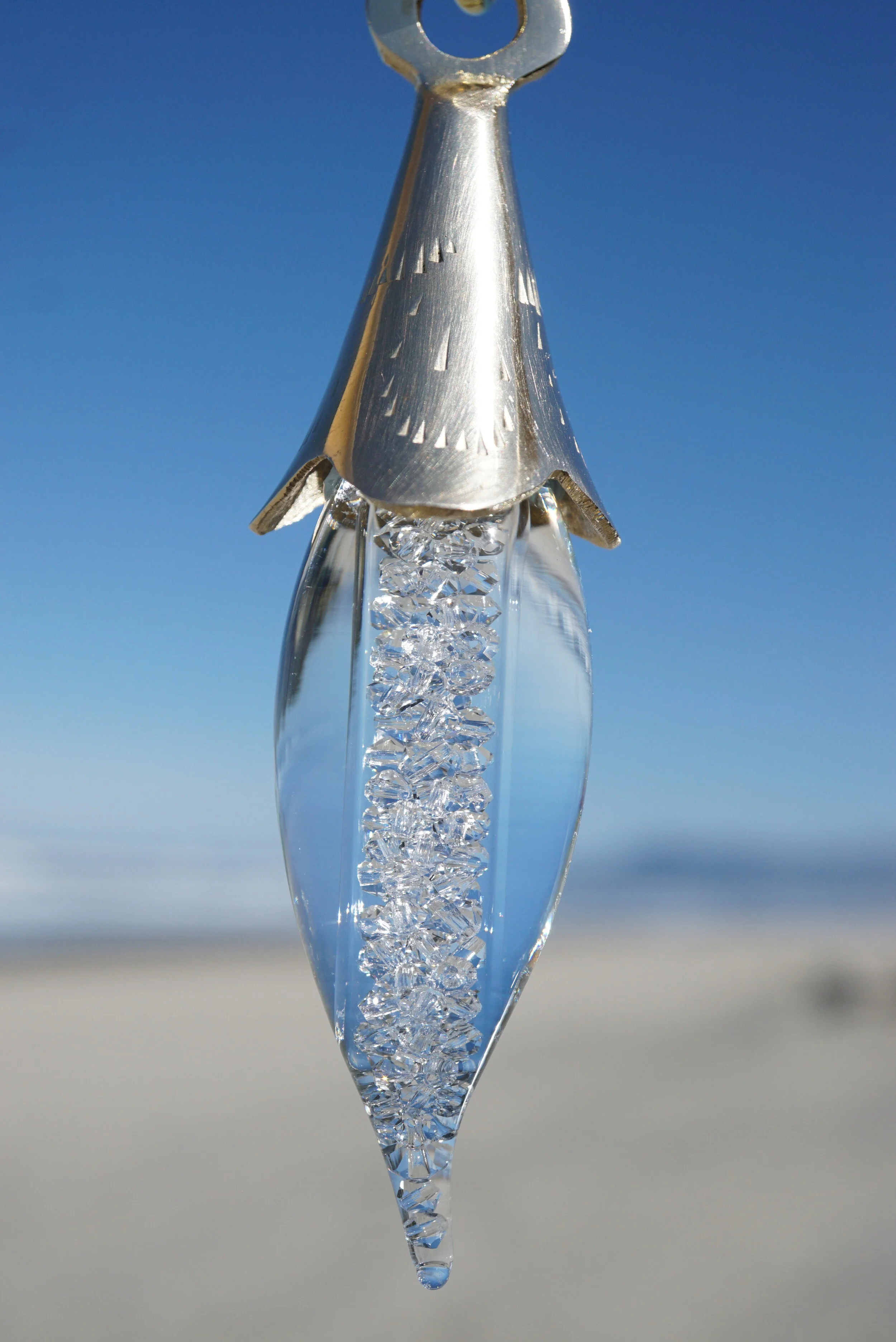 Chandelier Oregon Du Drop topped with a Lily Bell, with Preciosa "Diamond" Birthstones and filled with April Oregon Rain