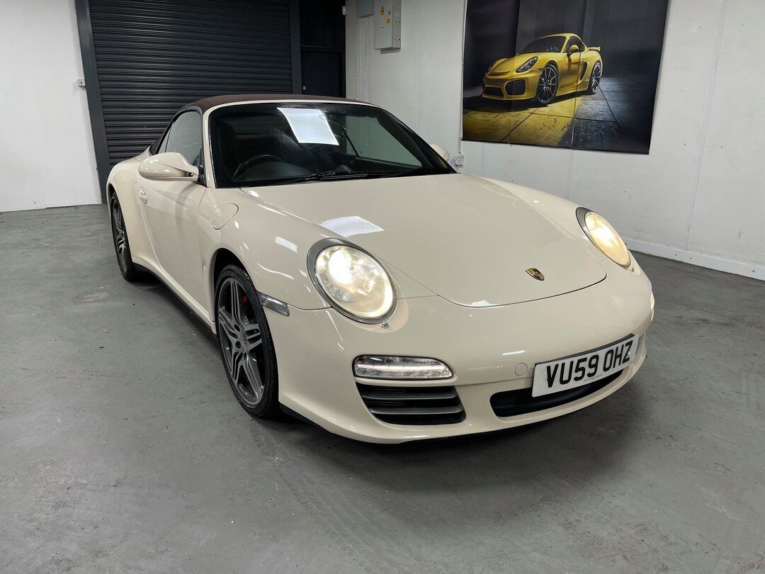 Porsche 911 997 Carrera 4S Gen 2 Cabriolet  PDK Automatic in stunning Cream White with contrasting brown Convertible roof and brown full leather interior. Lots of extras  including  switchable sports exhaust, Sports Chrono, Sports Plus, 19&quot; Turb
