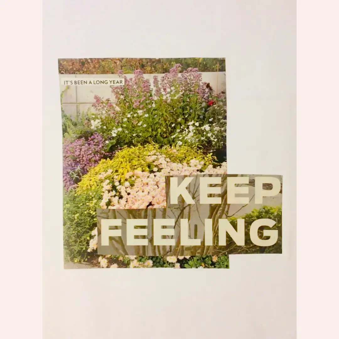 Floral collage with large white text reading 'Keep feeling' and smaller text saying 'it's been a long year.' A reminder to stay connected to emotions.