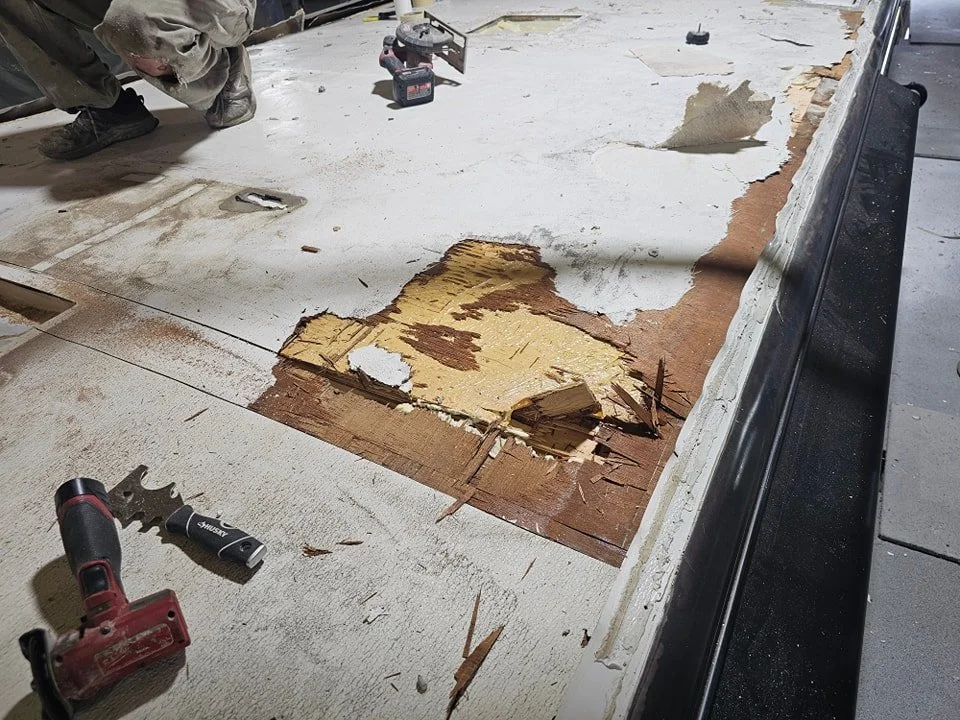 Hidden RV roof deck damage exposed after removal of the old roofing