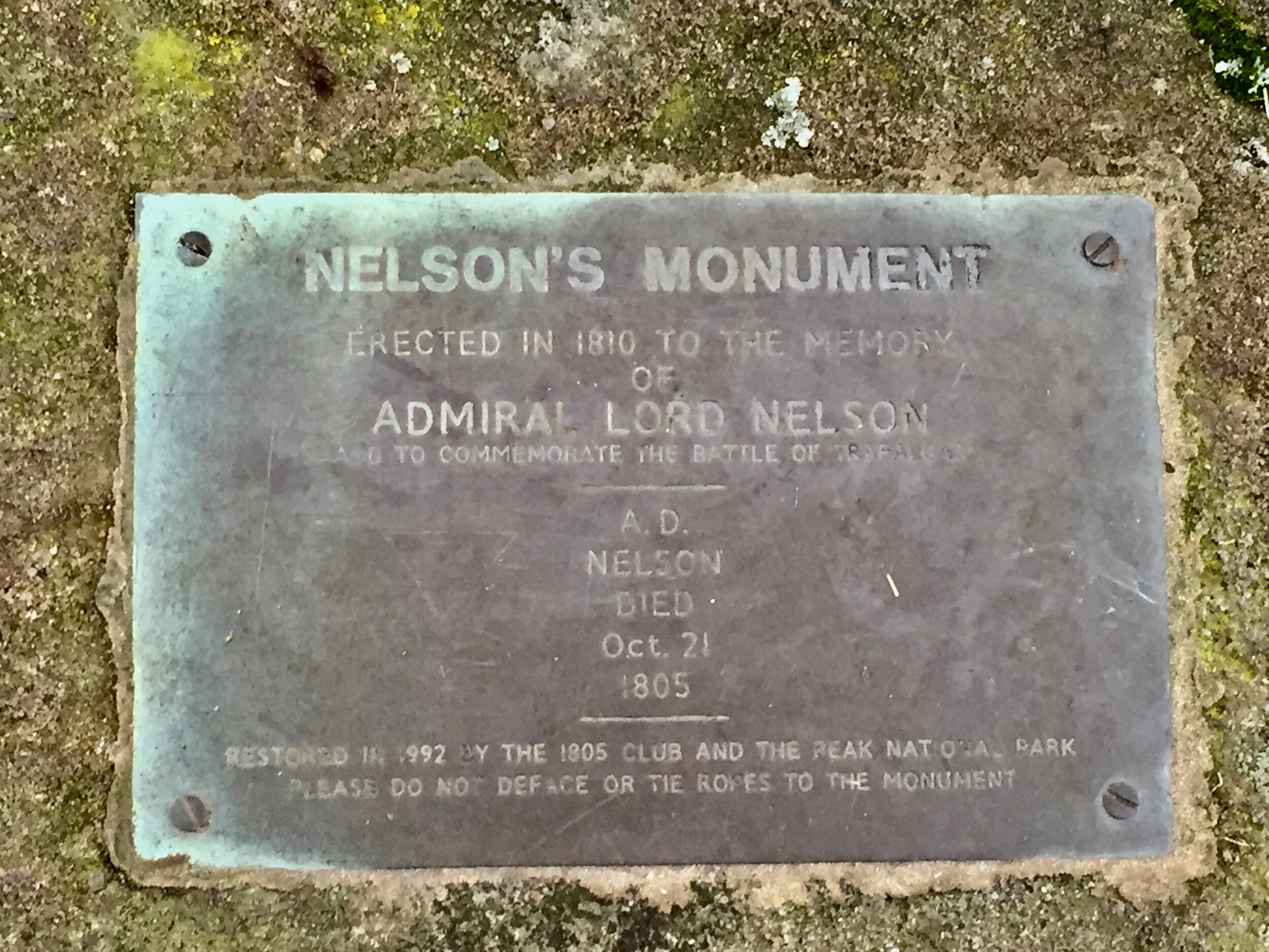  A close-up of the plate on the ground next to the obelisk. It reads ‘Nelson’s Monument / Erected in 1810 to the memory / of / Admiral Lord Nelson / To commemorate the Battle of Trafalgar / A.D. / Nelson / Died / Oct. 21 / 1805 / Restored in 1992 by 