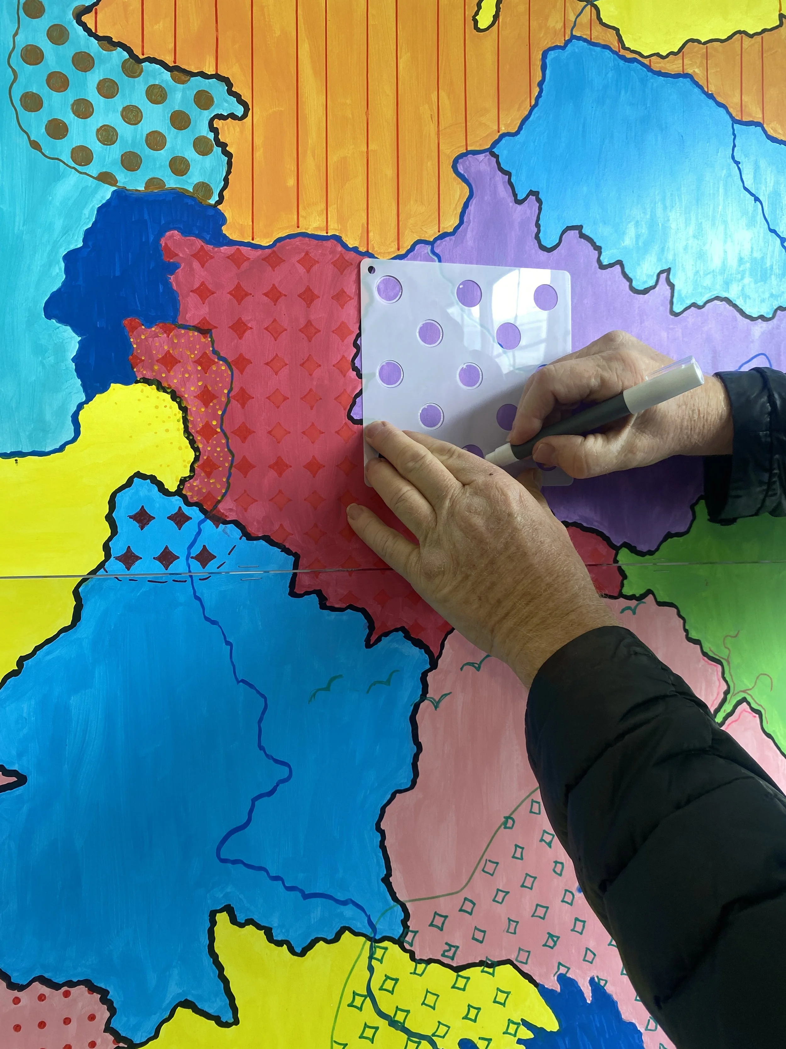  One person adds a pattern to a previously untouched country. 