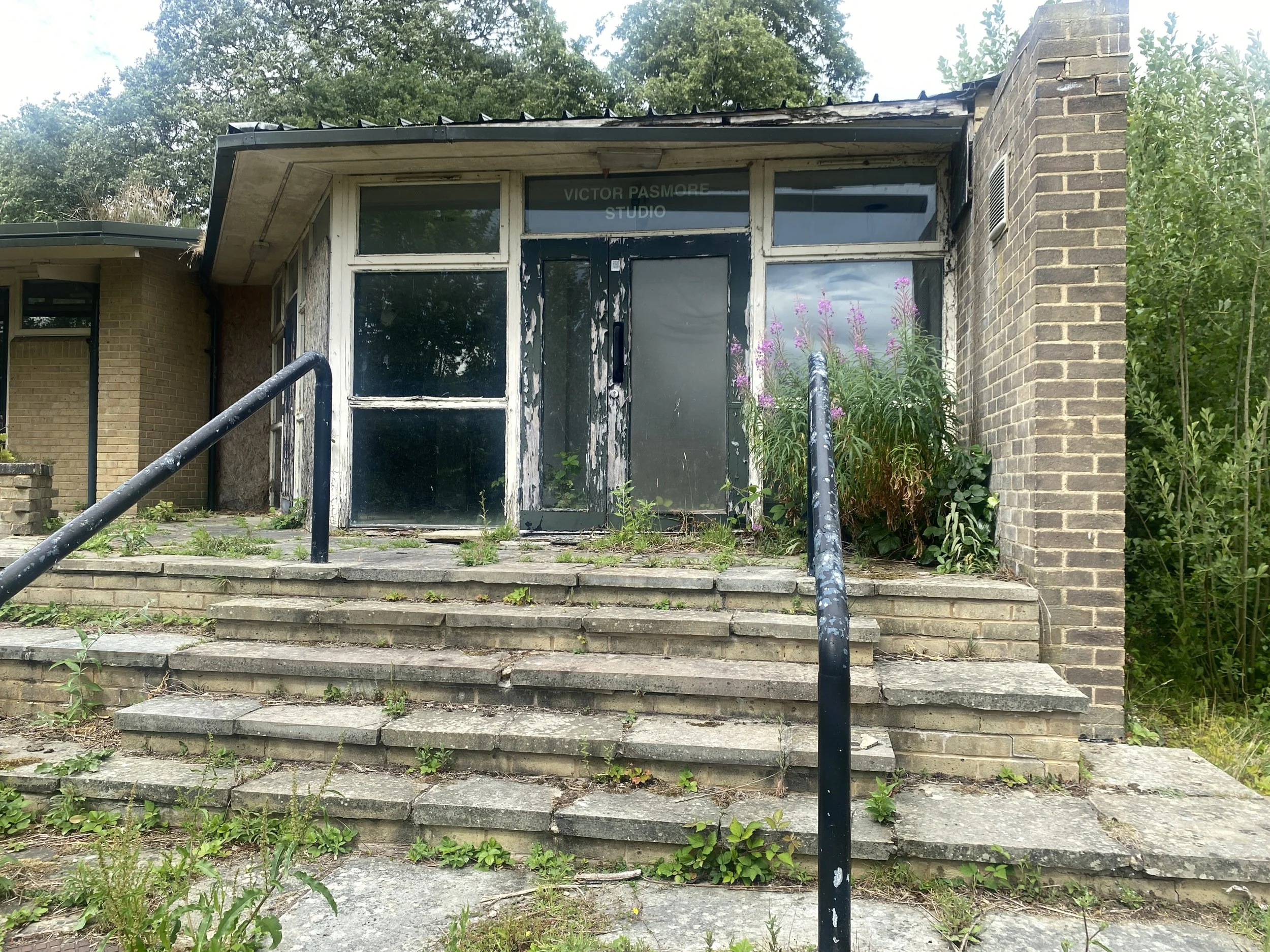  A stand of rosebay willowherb welcomes visitors to the peeling exterior of Victor Pasmore Studio. 