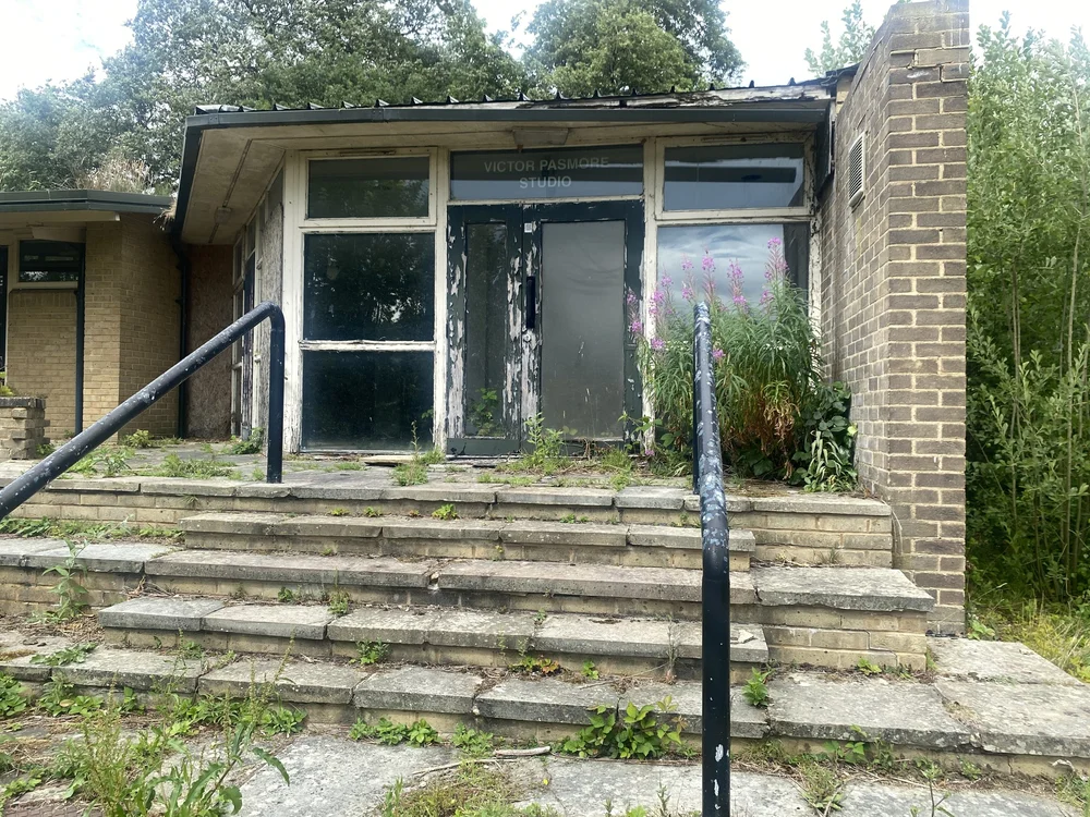  A stand of rosebay willowherb welcomes visitors to the peeling exterior of the Victor Pasmore Studio. 