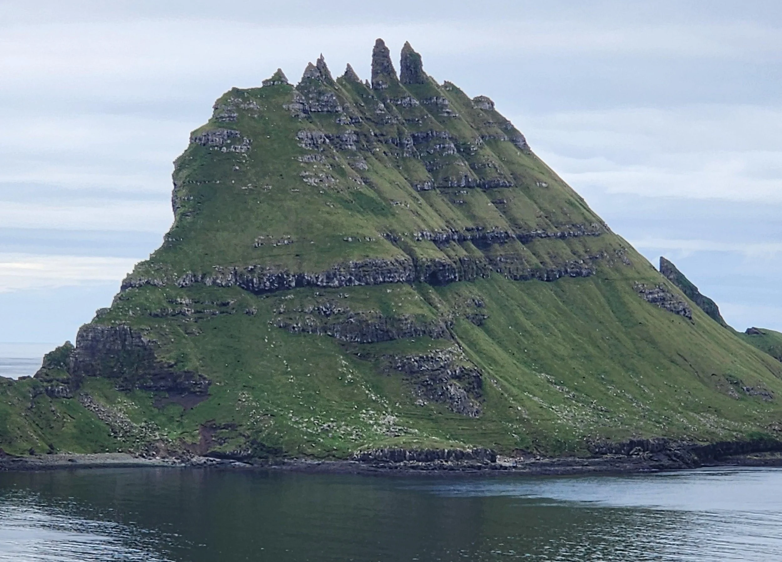 Half a mountain – on the hidden side, there is a sheer flat drop