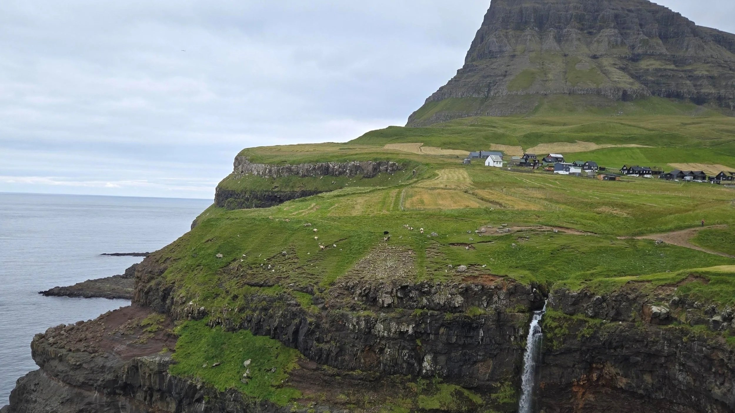  A famous tourist waterfall with a long drop at Gasaladur