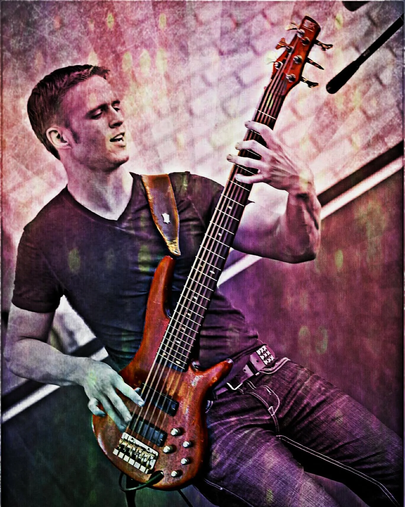 brian playing bass guitar