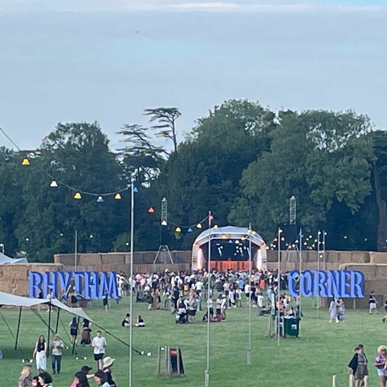 Rhythm Corner @ We Out Here 2023
@weouthere

Huge lettering designed for wayfinding signage to welcome music-lovers to the bass-driven Rhythm Corner second stage at We Out Here festival.

Bevelled 3D lettering designed and painted by mural artist Bec