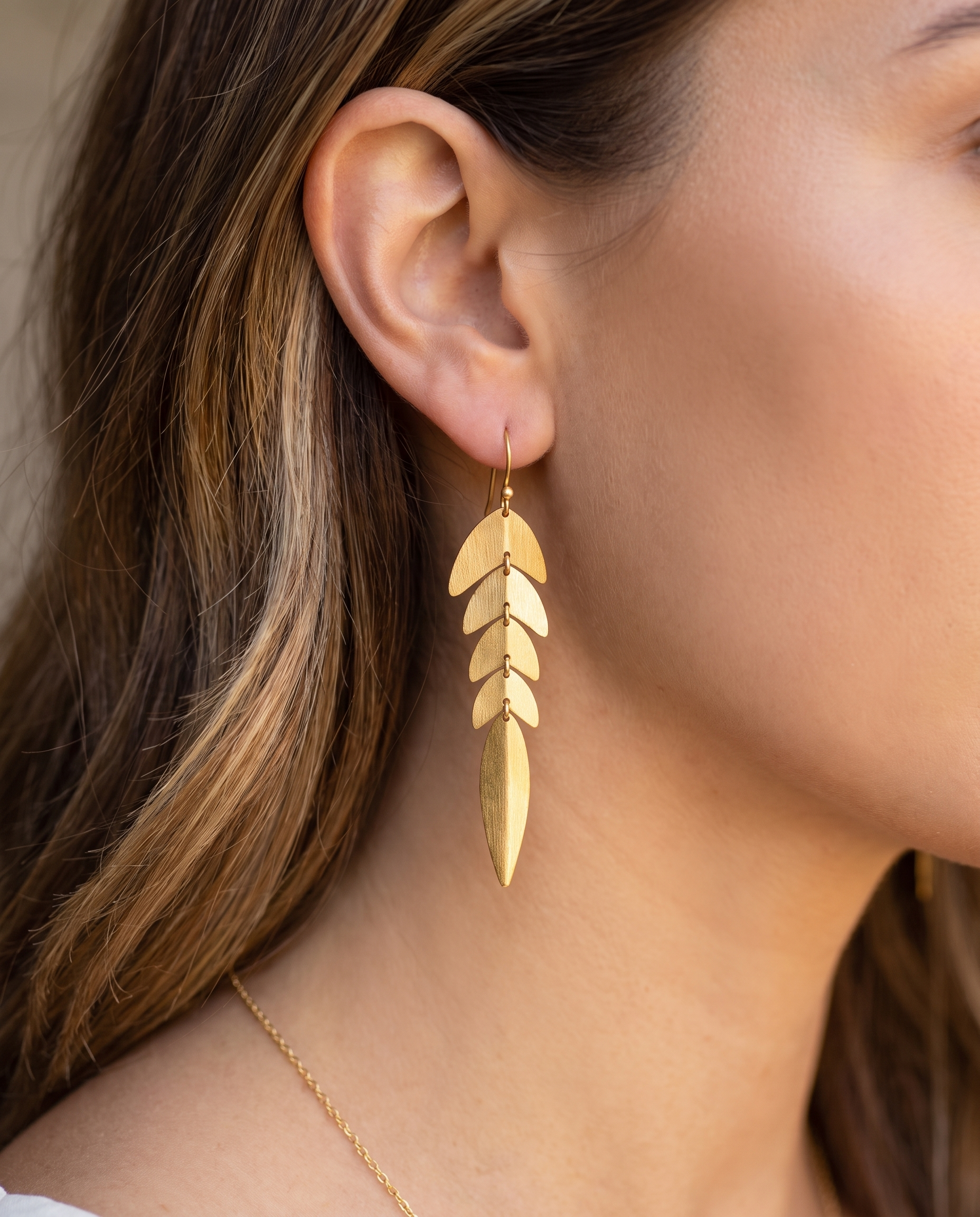 gold leaf drop earrings .png