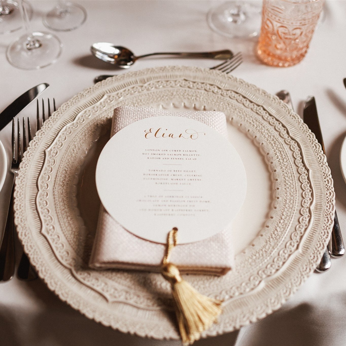 Shall we dine? // these beautiful circular menus have been one of my most popular requests. And it&rsquo;s easy to see why: a menu and place card combined, elevated with a beautiful luxurious gold tassel. A&amp;J opted for white to perfectly compleme