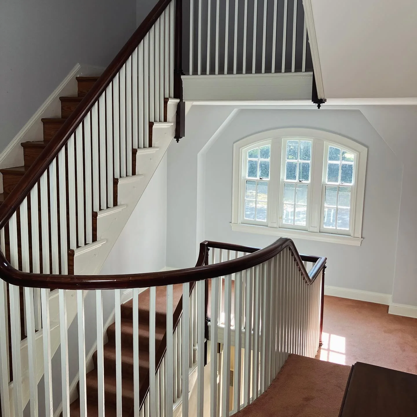 Kicking off the week with a great stair and landing.  Love the large windows, gentle curve, and open and airy feel. 

What do you think?  Are you lured into a home with a large stair and landing or do you think the stair should be straightforward and
