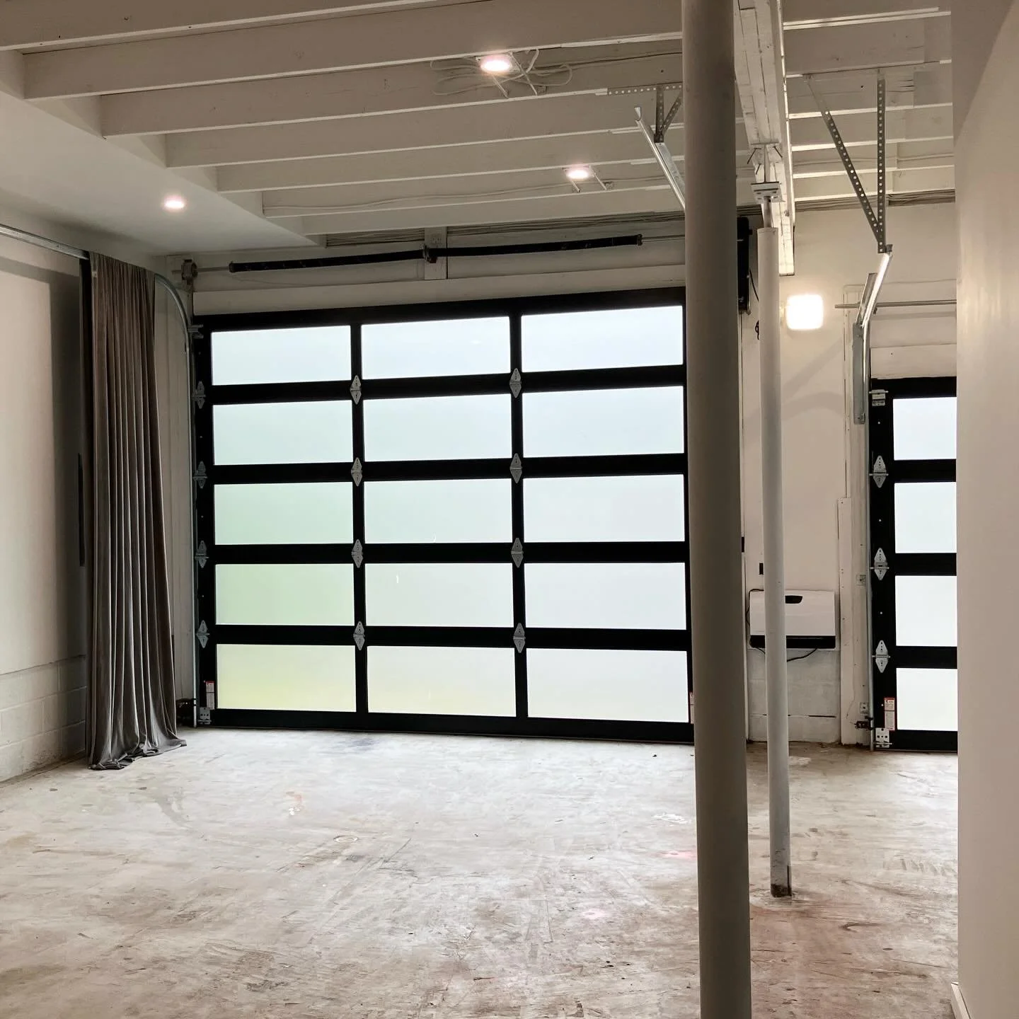 Feeling creative in this space I designed with and for @urbanrowphotography.

Enjoying the brightness of the light bouncing off the white walls with the simple black grid of the doors.  Working on some floor plan edits and this space is helping clear