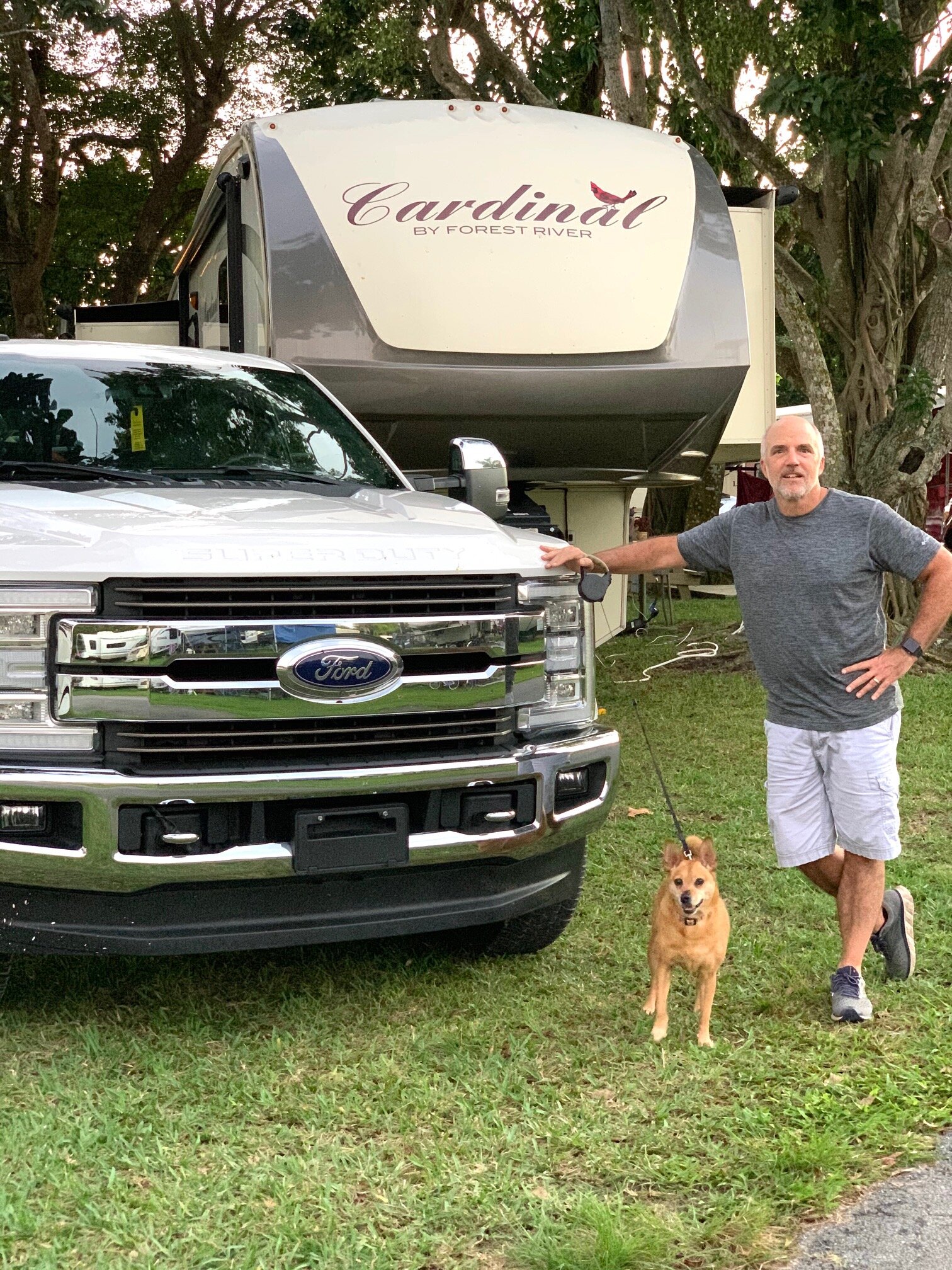  A man and his dog and his truck and his camper.  
