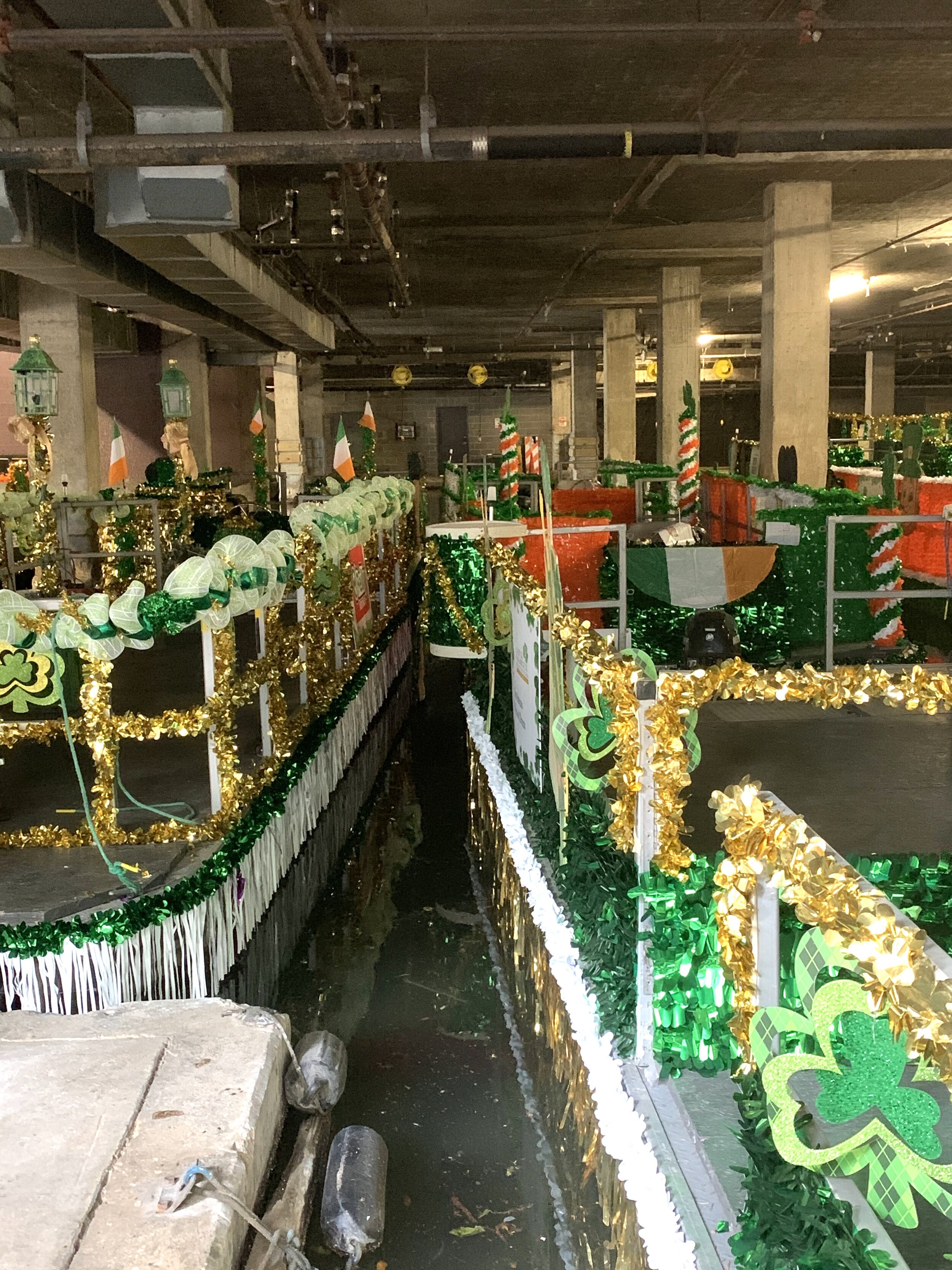  A building on the Riverwalk housed some of the floats for the St. Patrick’s Day parade. They were still in storage; the parade had been canceled. 