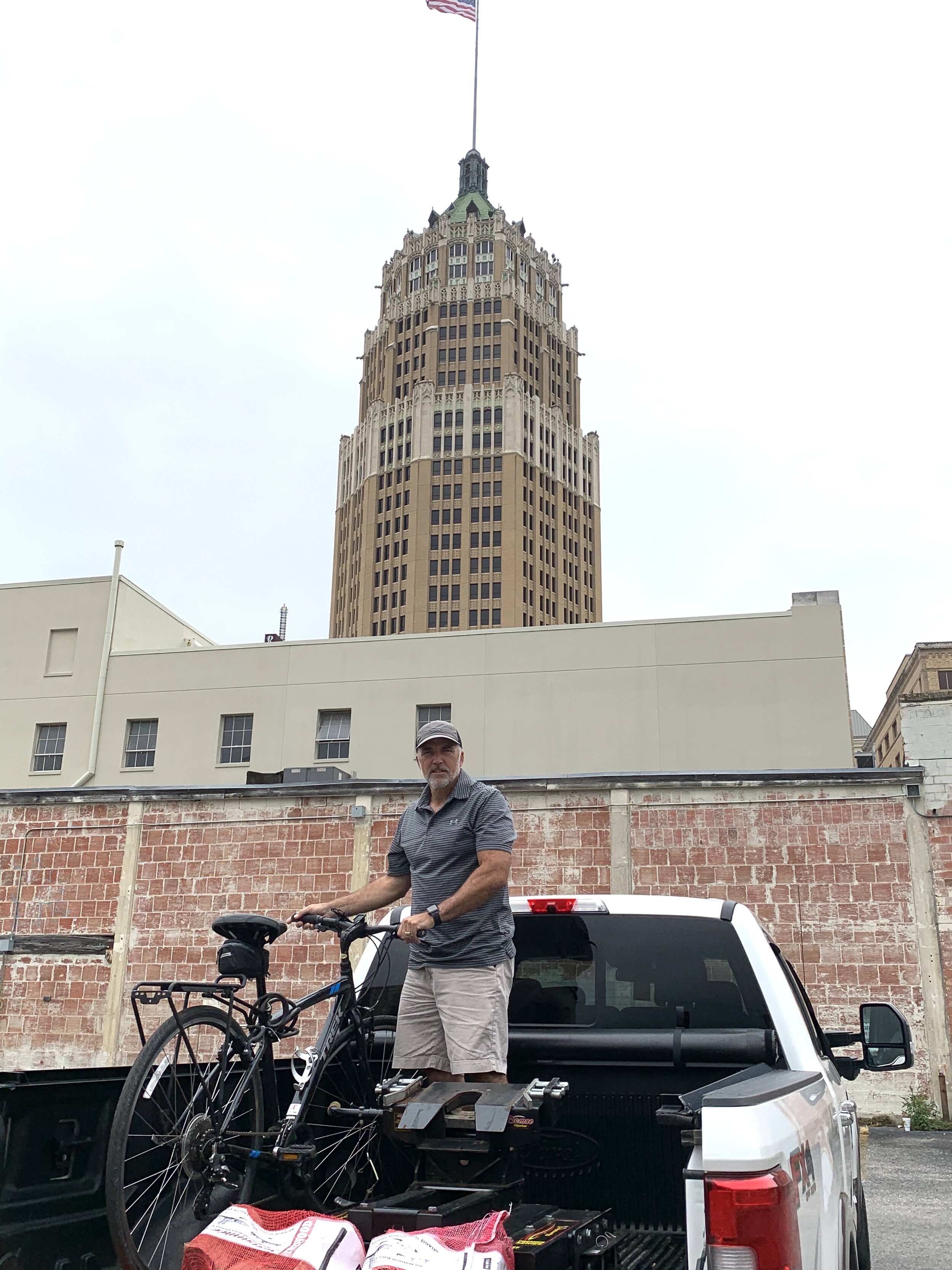  One day we toured San Antonio by bicycle. Pictured in the background is the Tower Life Building, built in 1929. The first six floors of the building housed the very first Sears &amp; Roebuck department store. 