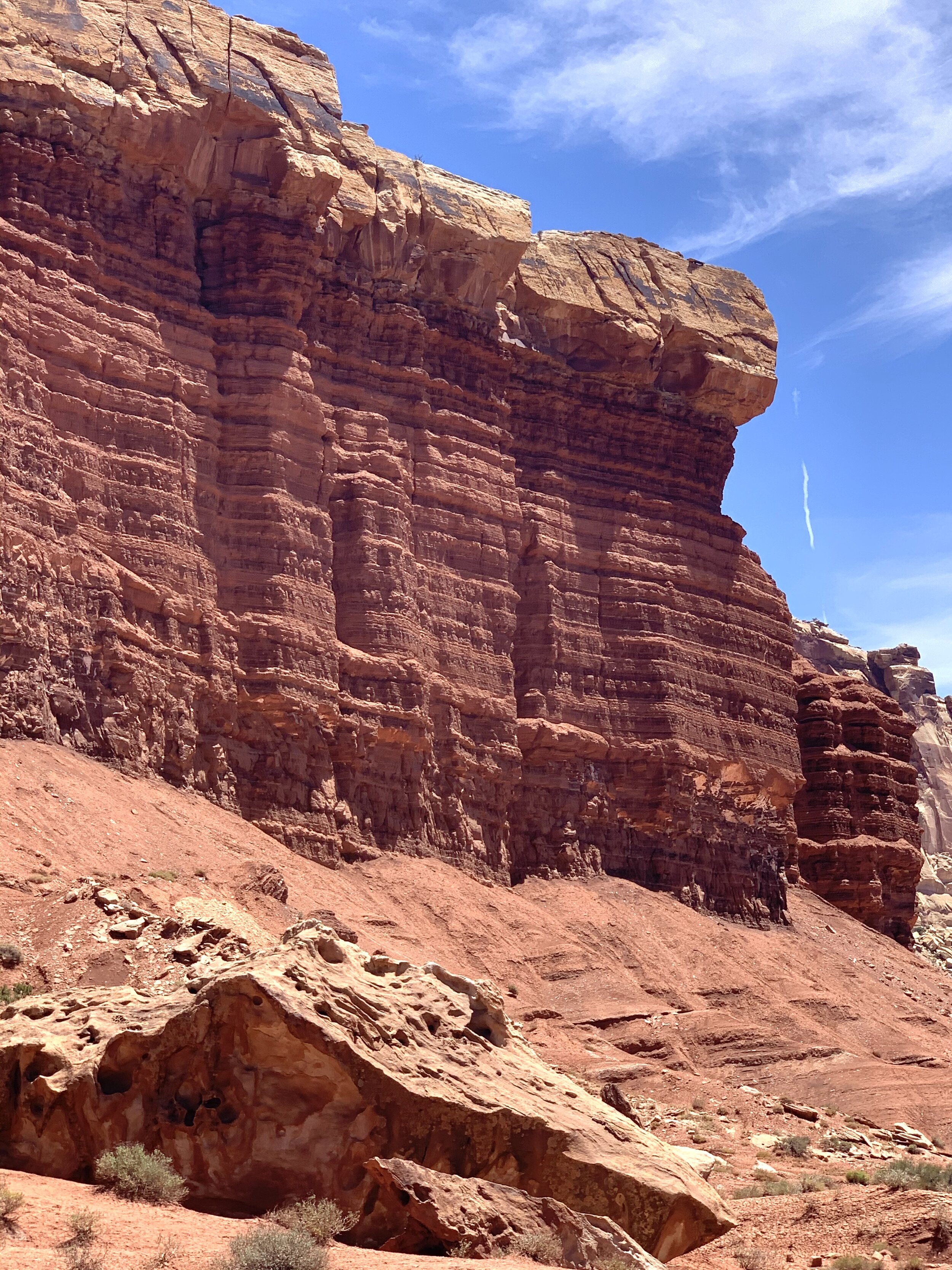  Capitol Reef National Park is about 140 west of Canyonlands and surrounds a long wrinkle in the earth known as the Waterpocket Fold. This area is filled with layers of golden sandstone, canyons, and beautiful rock formations.&nbsp; 