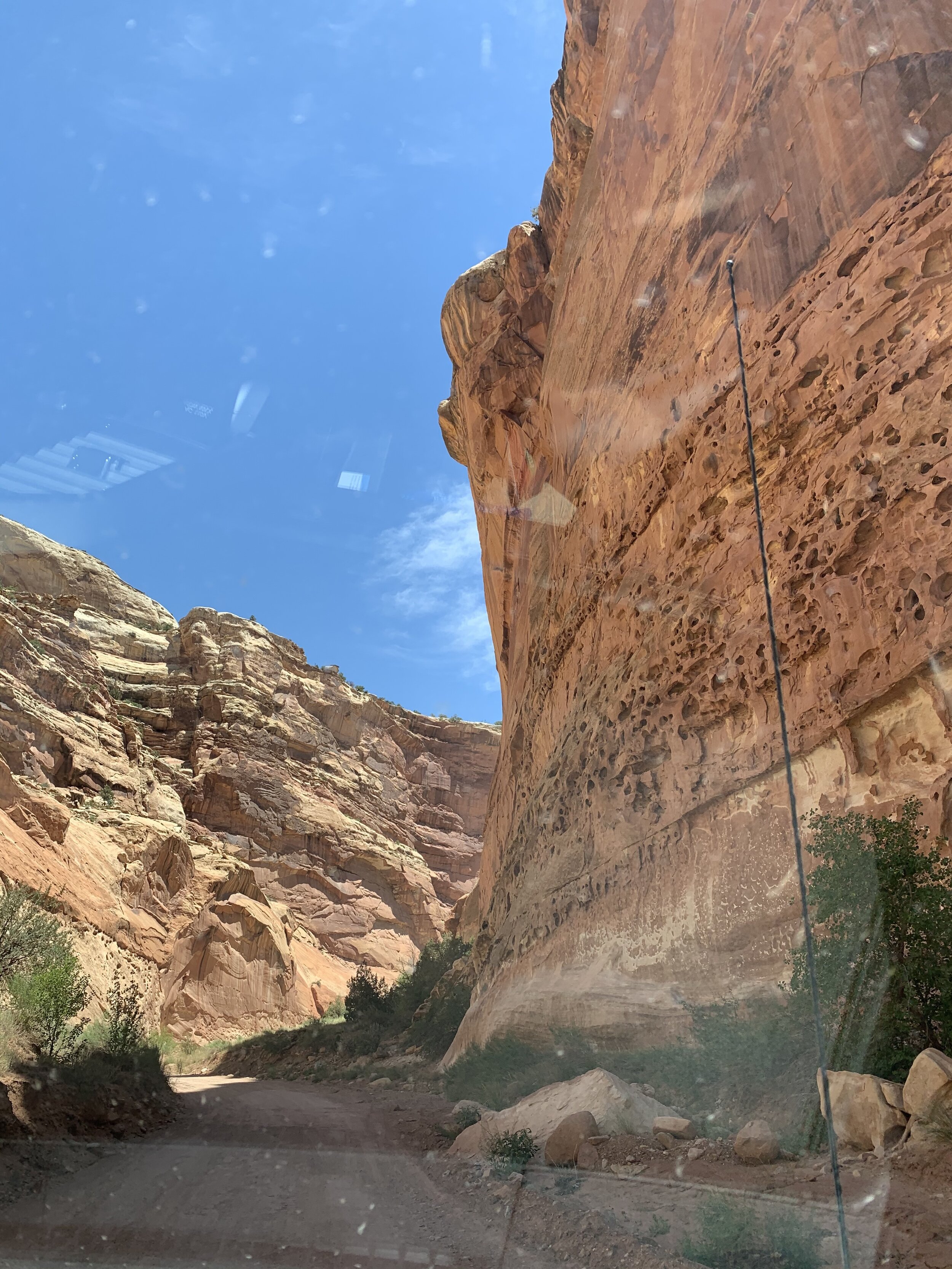   Capitol Reef is known to have monsoons. There are warning signs everywhere not to enter these areas if there is a threat of rain. The abundant rocks cause the water not to be easily absorbed into the ground, and the force of the water can knock th
