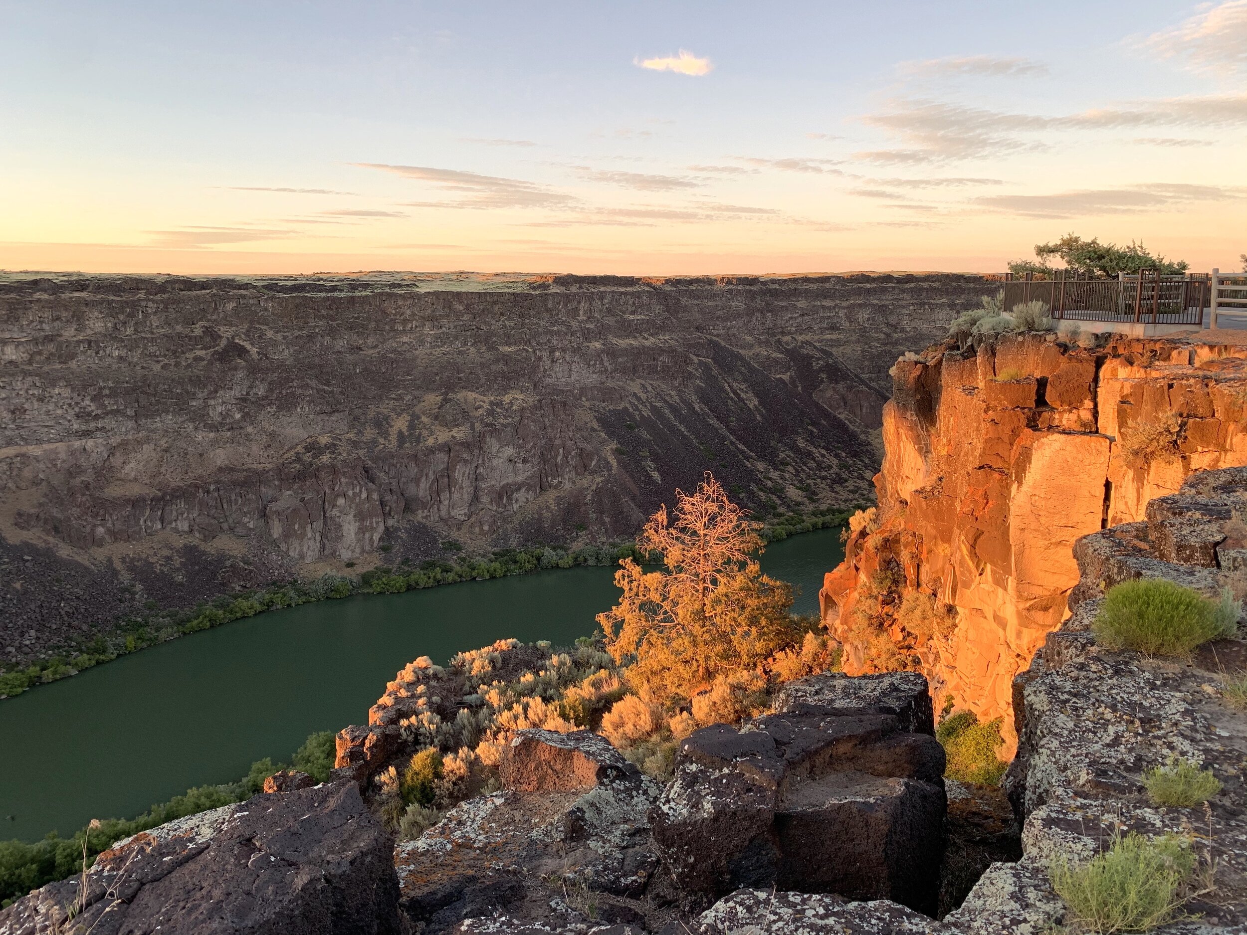 After observing the falls and marmots at Shoshone Falls Park, we heard we should drive a few miles down the Snake River to see the Perrine Bridge. It seems our timing was perfect; we arrived just as the sun was beginning to set on the rocks. 