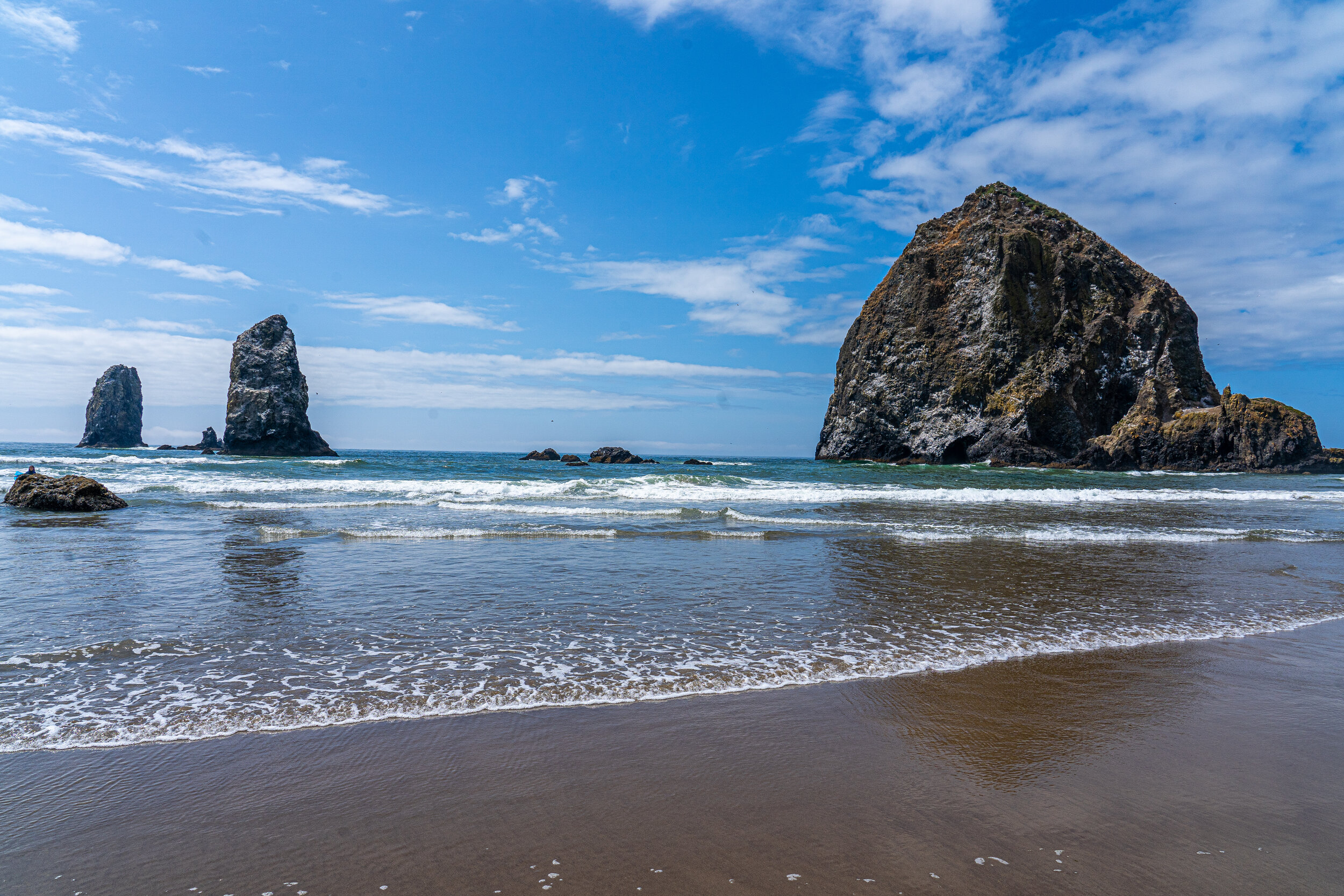  At  Cannon Beach , we saw our first haystack rock out in the water. While this may be a familiar scene on the west coast, we were pretty impressed! We had lunch at a brewery that was also a  hardware store,  thus their name,   Screw and Brew   .  Th