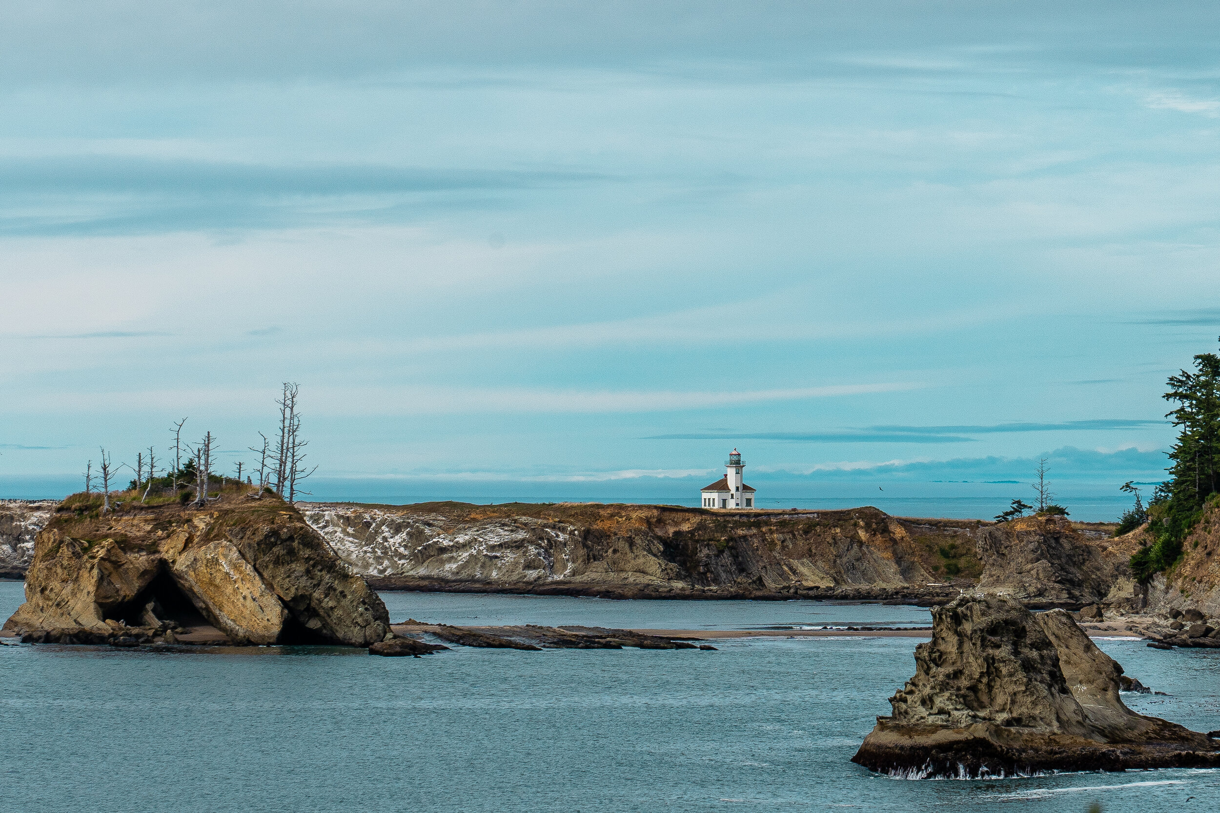  From Sunset Bay State Park, we can see  Cape Arago Lighthouse . In operation from 1934-2006, this smaller-scale lighthouse is listed on the National Register of Historic Places but is not open to the public, and is encircled in a fence so that no on