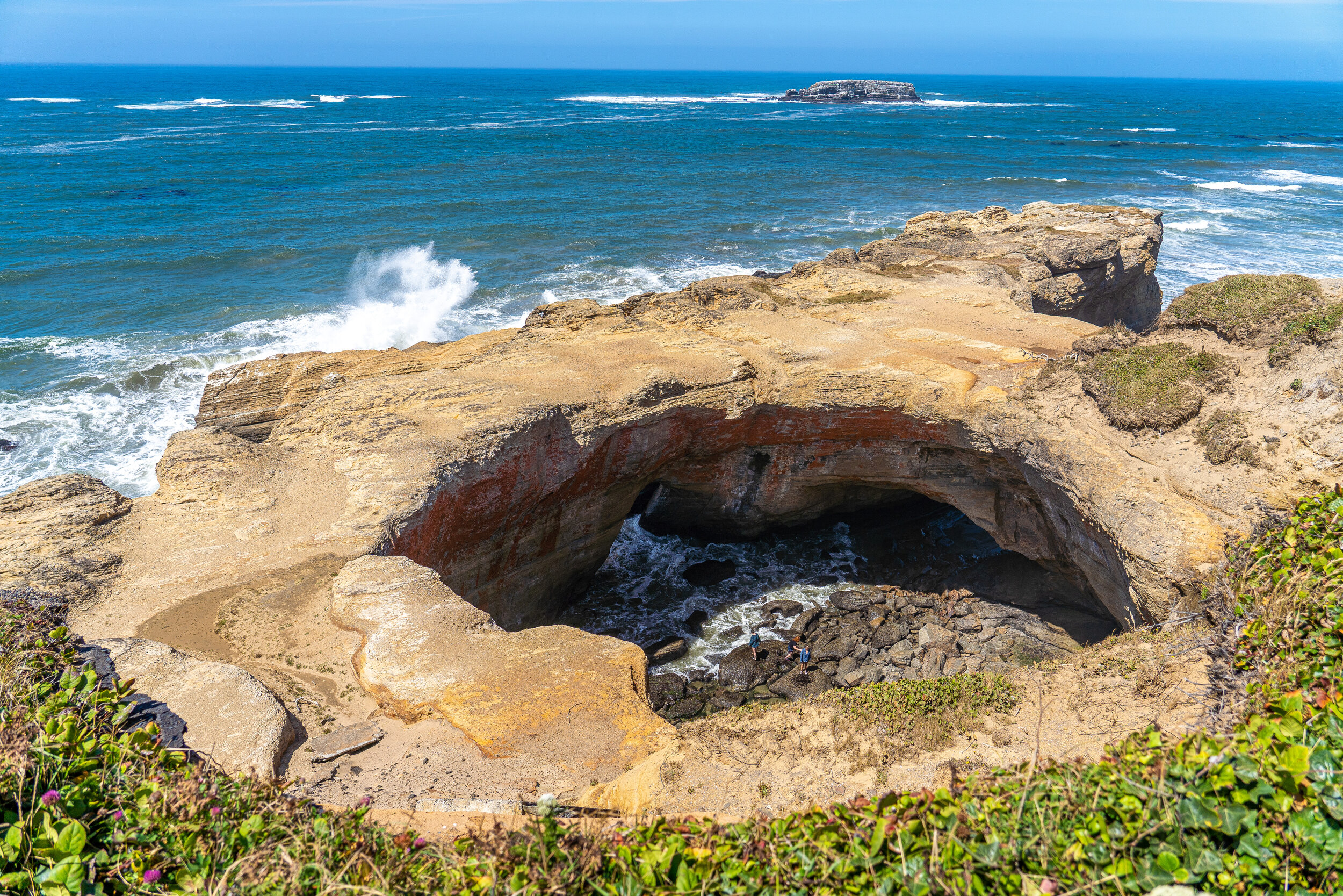   Devil’s Punchbowl State Natural Area &nbsp;in  Otter Rock  got its name from the swirling churn of the sea as wanves fill the rocky bowl like a witch’s brew. Waves enter the bowl through openings in the base and often violently churn, swirl, and fo
