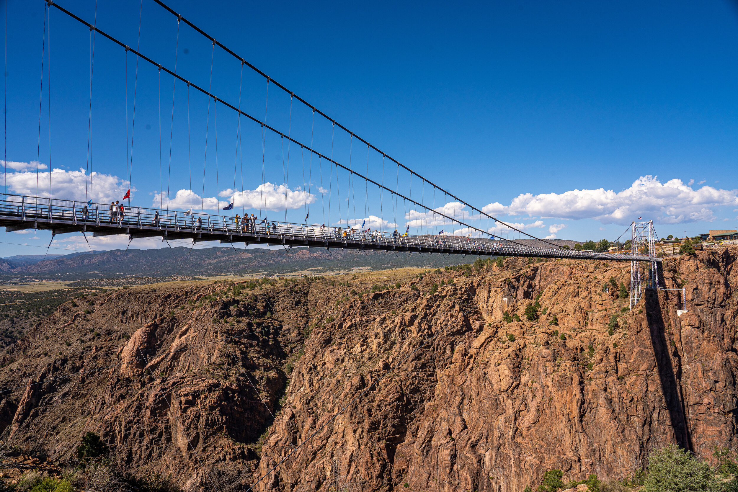   Royal Gorge Bridge and Park  in Cañon City is home to the highest suspension bridge in America. Built in 1929 by 80 men, in only 7 months, the bridge is a wonder in itself, in addition to towering nearly 1,000 feet over the Arkansas River.  