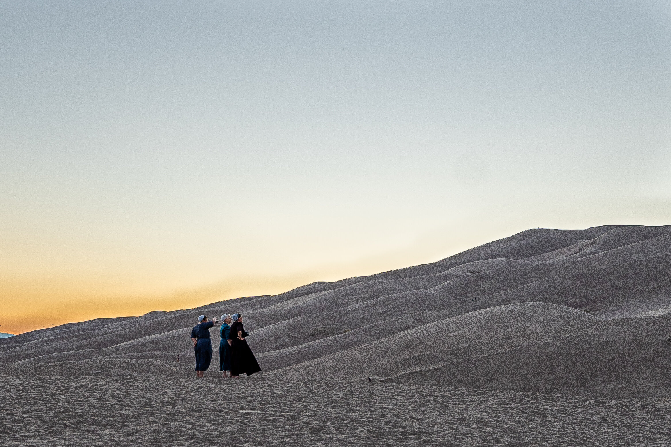  Craig spotted these Mennonite women enjoying the dunes and took a photo opportunity for what has become one of my most favorite pictures.  