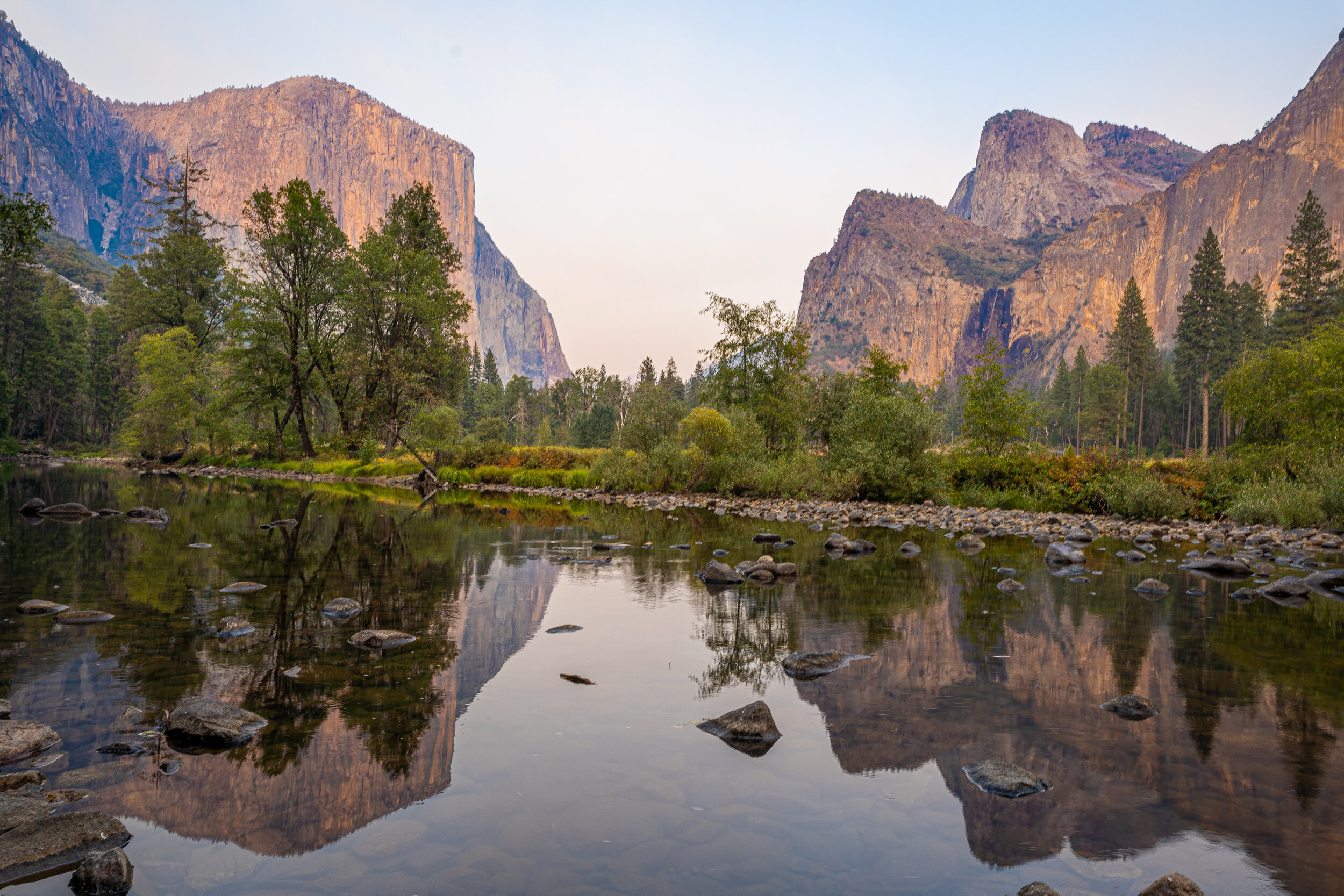  We made it,  Yosemite National Park ! This iconic view of  Yosemite Valley  features  El Capitan,  on the left, one of the most iconic rock formations in the world, and  Half Dome,  behind the shortest mountain on the right. The water in the valley 
