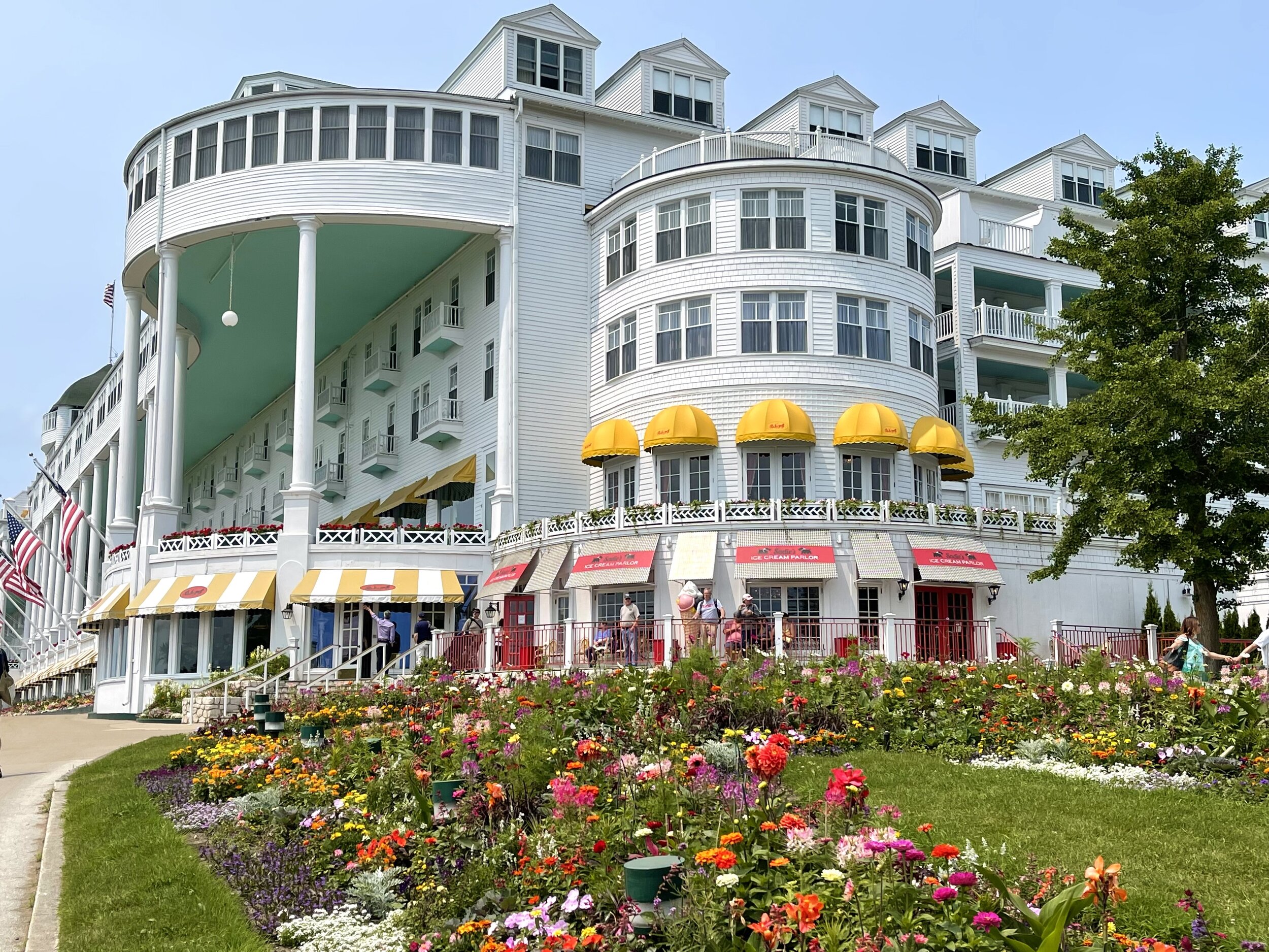   The Grand Hotel,  the most prominent feature on Mackinac Island, is grand indeed. Five US presidents, Thomas Edison, Mark Twain, and countless other notables have stayed here since the doors opened in 1887. The hotel became a family-run business in