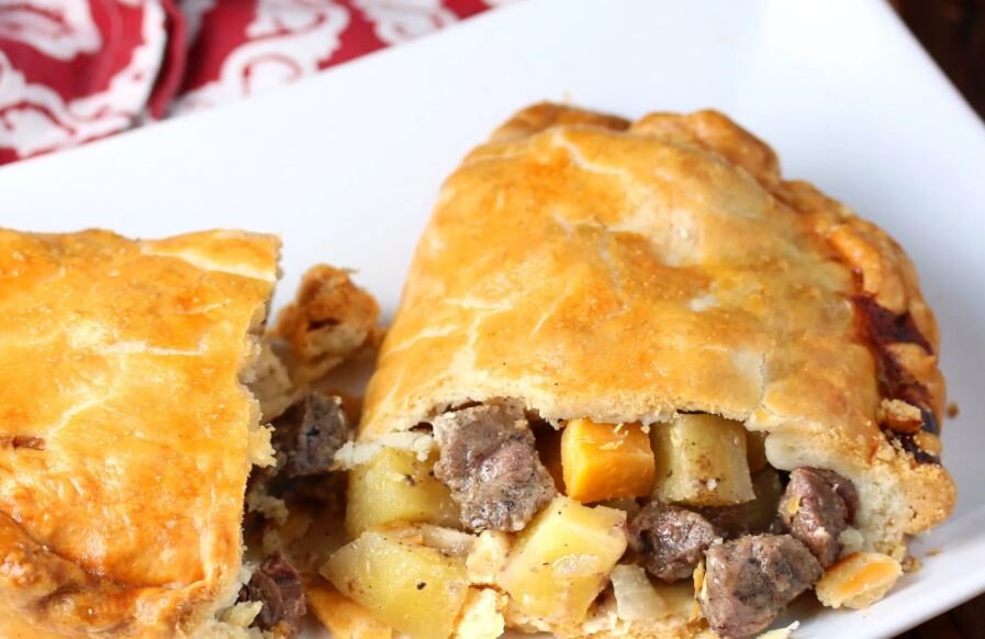  Pasties, ( pronounced PASS-tees ) "the meaty center of Yooper food," are filled with beef, diced potato, yellow turnip or rutabaga, and onion, seasoned with salt and pepper, and baked. Pasties were established as a UP staple when the copper mining r