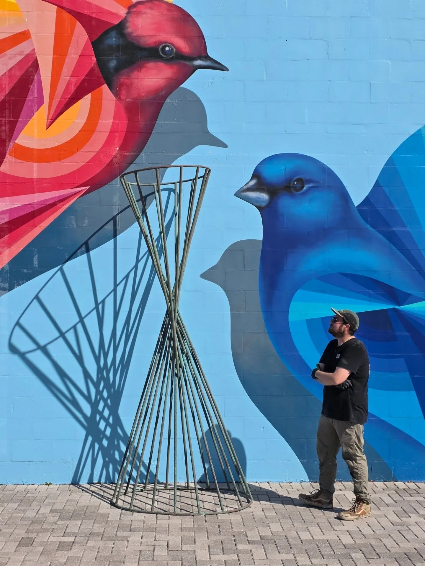 Have you ever seen this throwback?
"Braided Copper" got brought out into the sun the other day! The natural patina on the rods look so good next to this Lueza Mural on the ArtsXchange Campus! 
Come check it out on the next Second Saturday E
