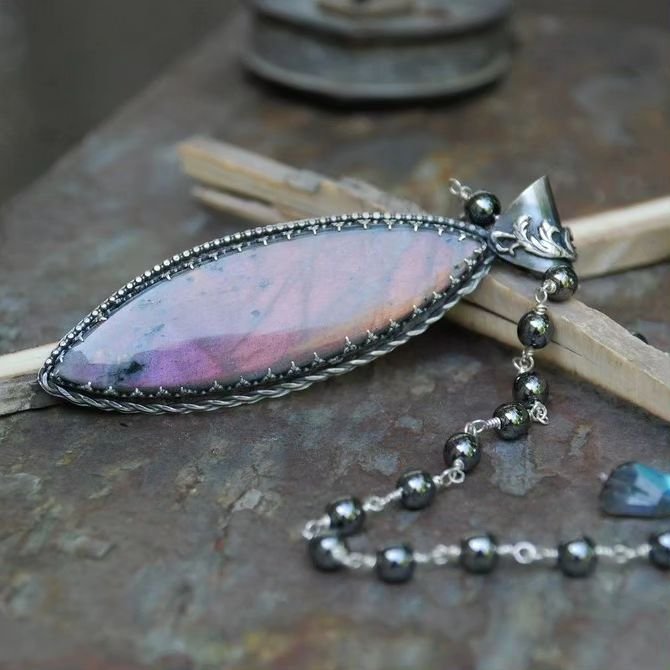✨Watch the magic come alive in this amazing multi-colored marquise labradorite.  Let your jewelry speak for you. ✨
.
#labradoritejewelry #necklacelove #magicaljewelry #artistherapy #arttowear #gothicvibes #rockstarstyle #adriennecantler #artjewelryby