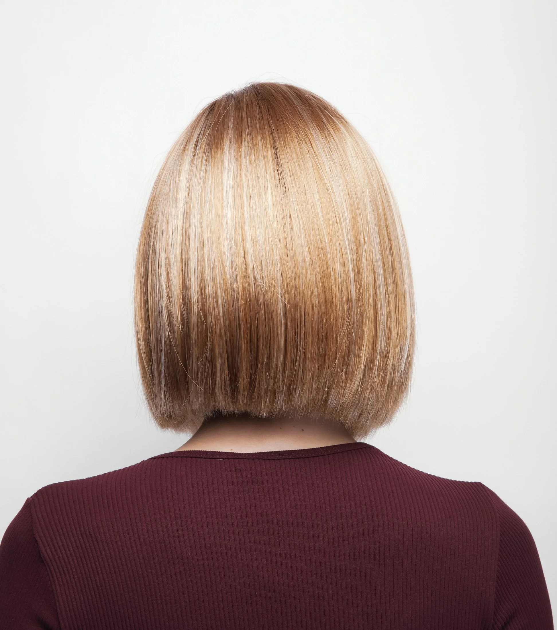 back view of a model wearing the Kai wig by Rene of paris