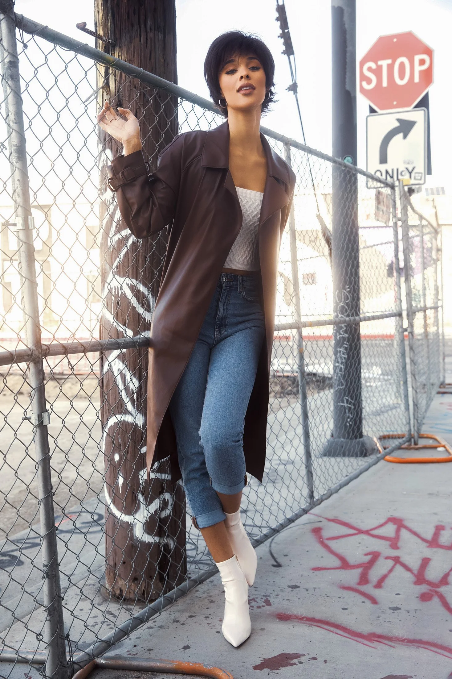 Model standing in the street wearing the Coco wig by Rene of Paris
