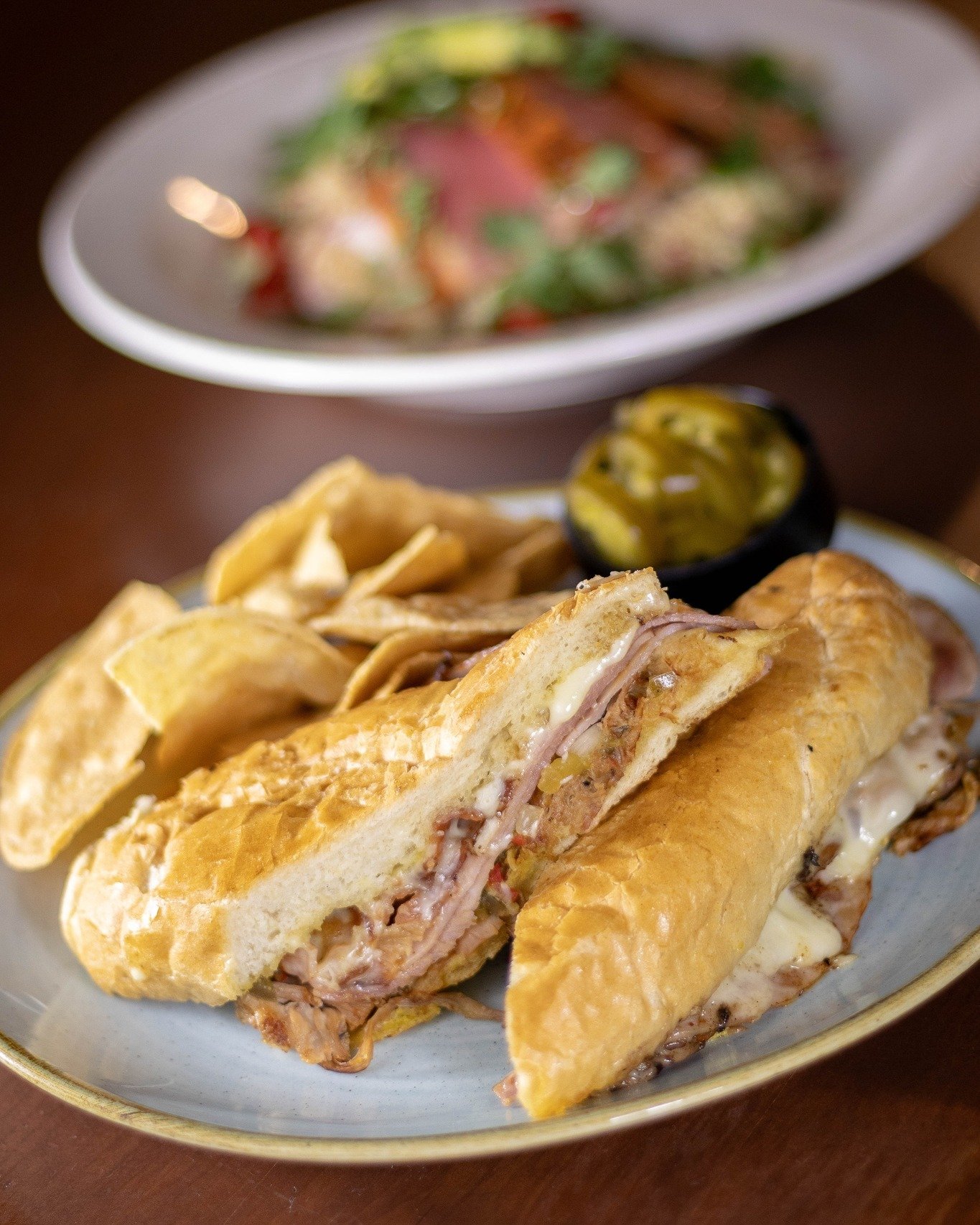 LET'S LUNCH 😋 We're open at 11 AM daily in Edina &amp; Wed-Fri in St. Paul. Most of our menu is available all the time, but we do have a couple special items you can only order during the day. Come try our new cubano sandwich with ham, slow-cooked p
